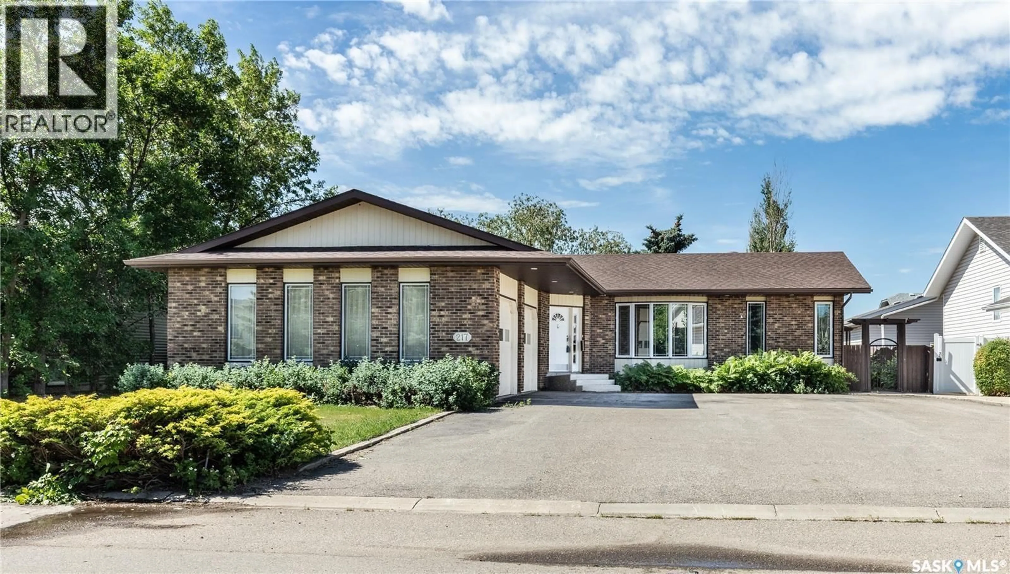 Home with brick exterior material, street for 217 13TH AVENUE, Watrous Saskatchewan S0K4T0