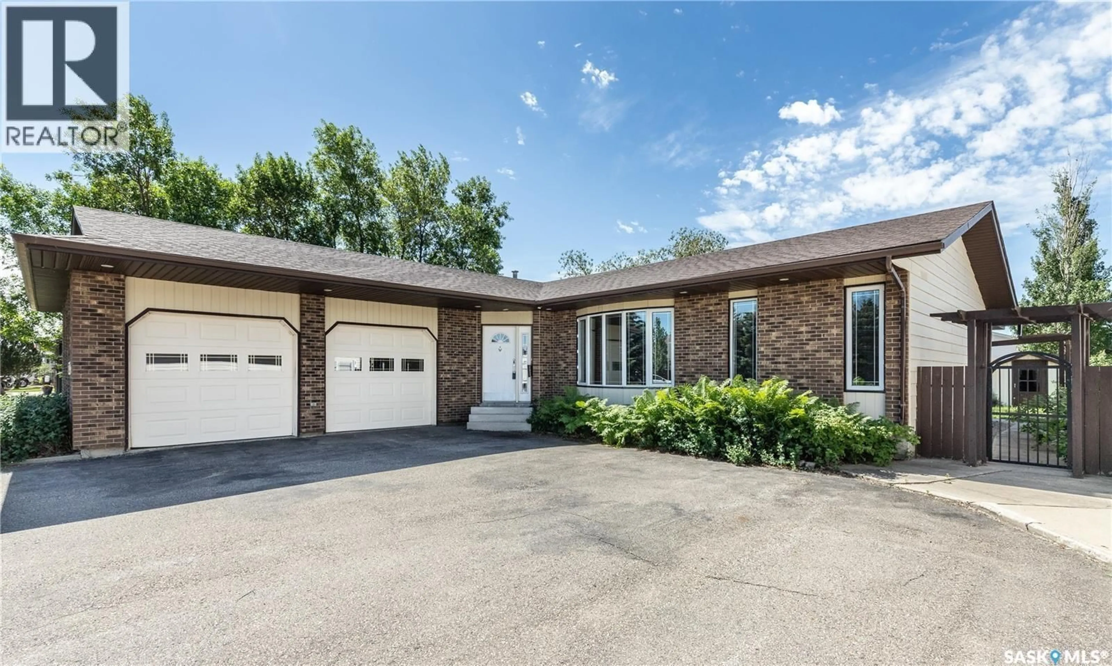 Home with brick exterior material, street for 217 13TH AVENUE, Watrous Saskatchewan S0K4T0