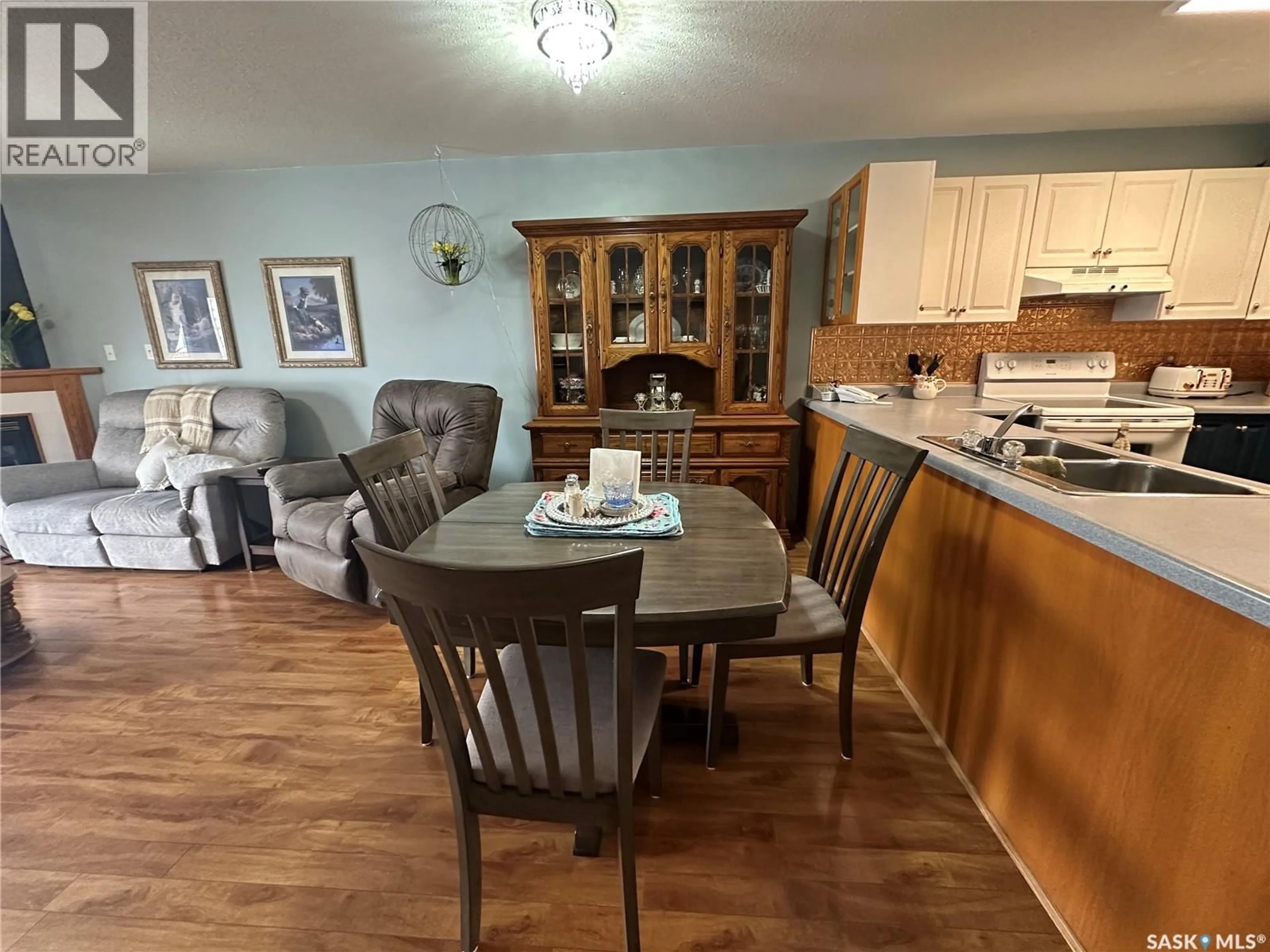 Dining room, wood/laminate floor for 2011 A 96TH, Tisdale Saskatchewan S0E1T0