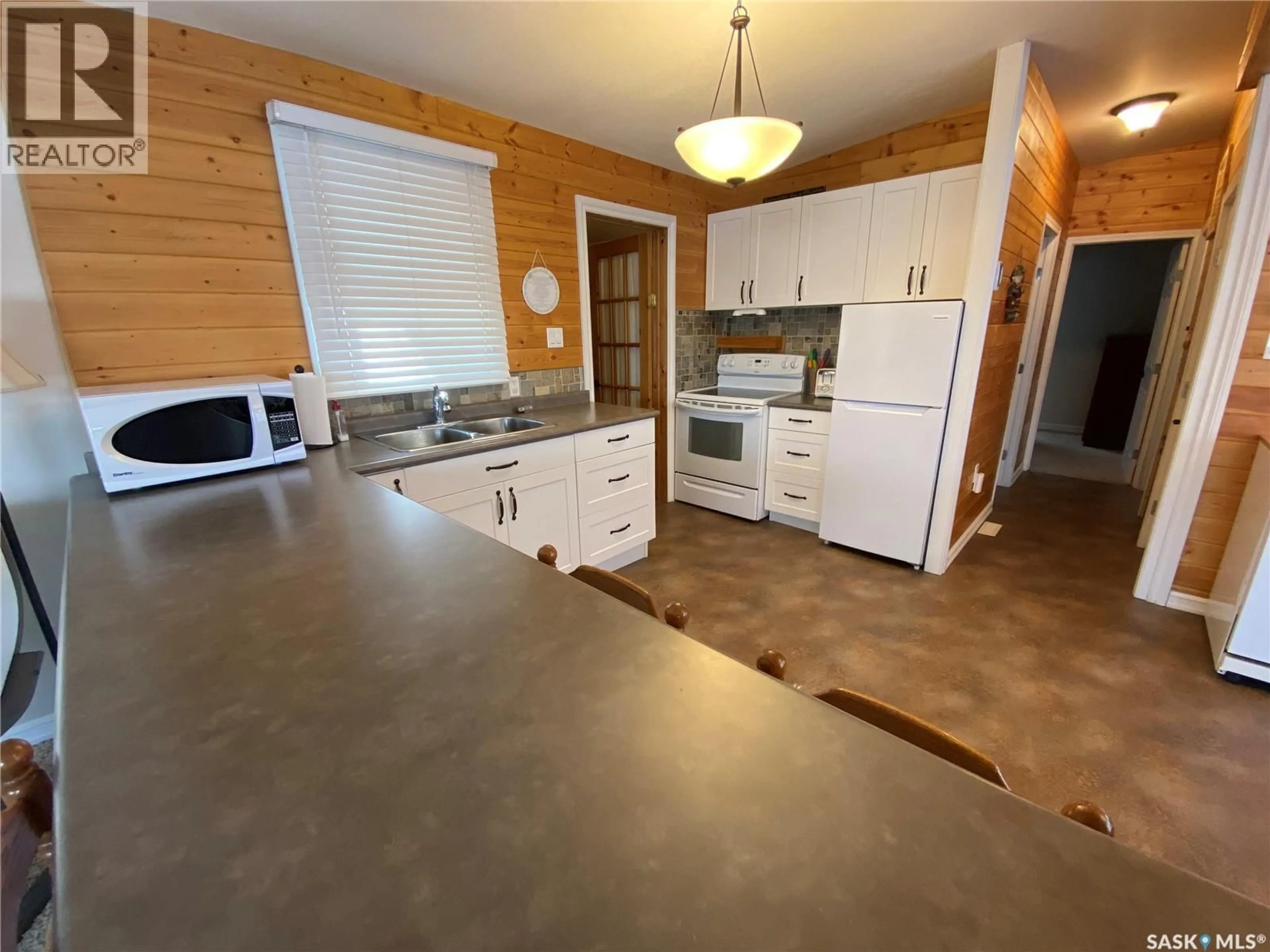Open concept kitchen, unknown for 406 CAPALANO DRIVE, Good Spirit Lake Saskatchewan S0A0L1