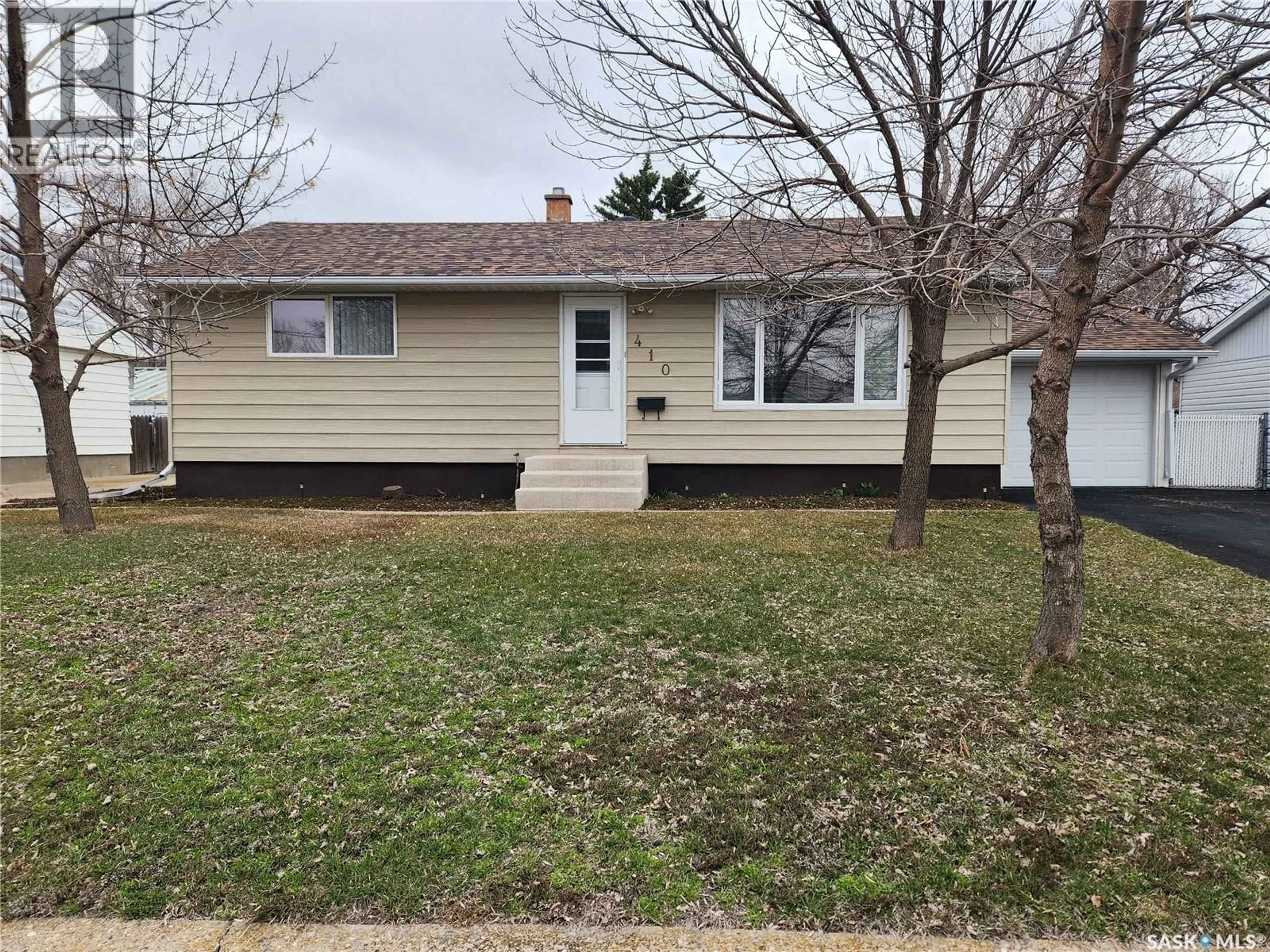 Home with vinyl exterior material, street for 410 GALLAWAY STREET, Estevan Saskatchewan S4A0A9