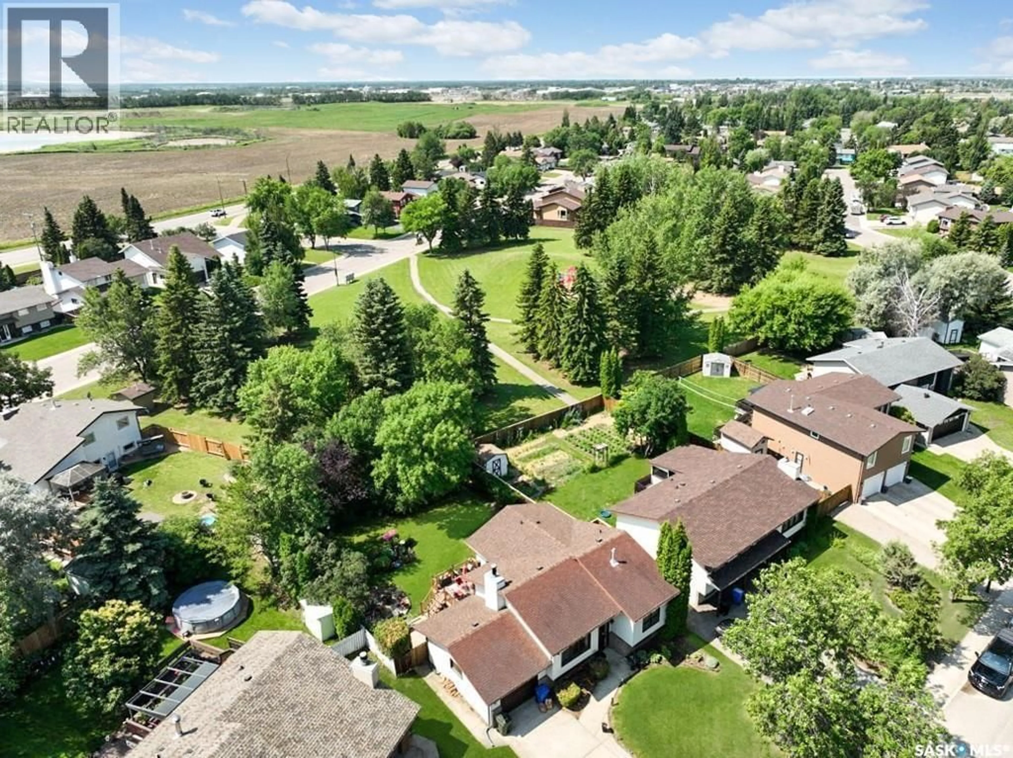 A pic from outside/outdoor area/front of a property/back of a property/a pic from drone, street for 3069 SHERMAN DRIVE, Prince Albert Saskatchewan S6V7H5
