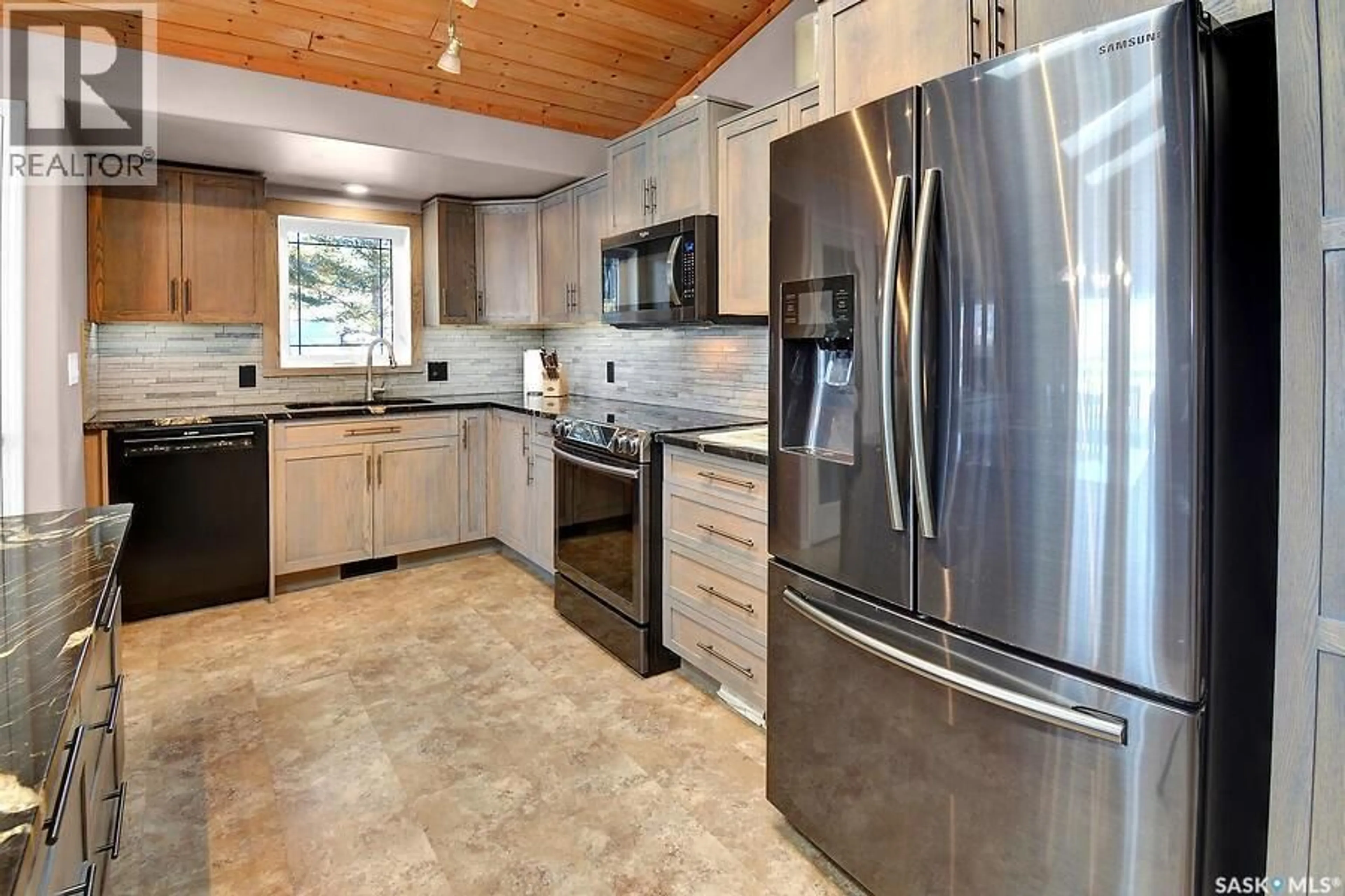 Open concept kitchen, ceramic/tile floor for 3013 BONNE MADONE BEACH, Wakaw Lake Saskatchewan S0K4P0