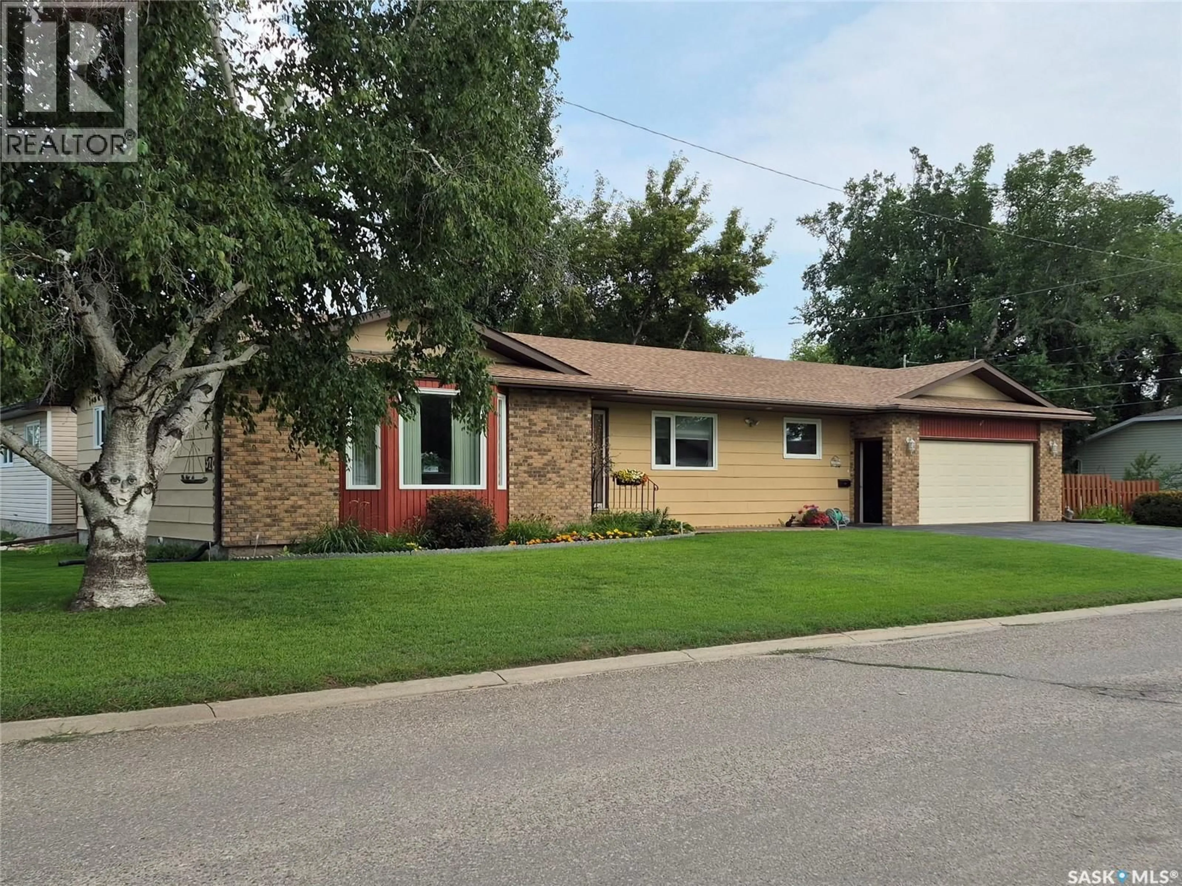 Home with brick exterior material, street for 329 DOUGLASS STREET, Outlook Saskatchewan S0L2N0