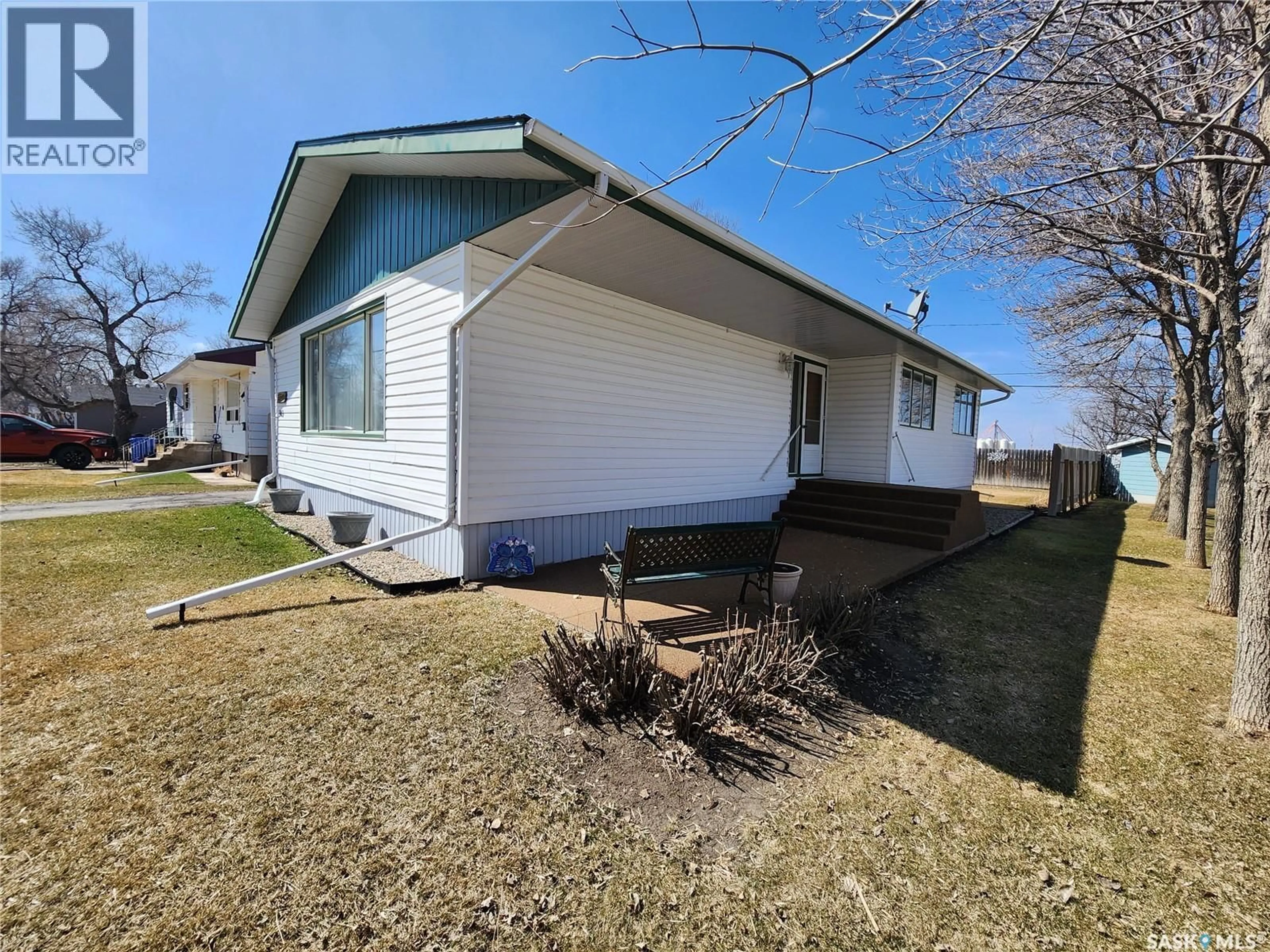 A pic from outside/outdoor area/front of a property/back of a property/a pic from drone, street for 503 1ST AVENUE, Lampman Saskatchewan S0C1N0