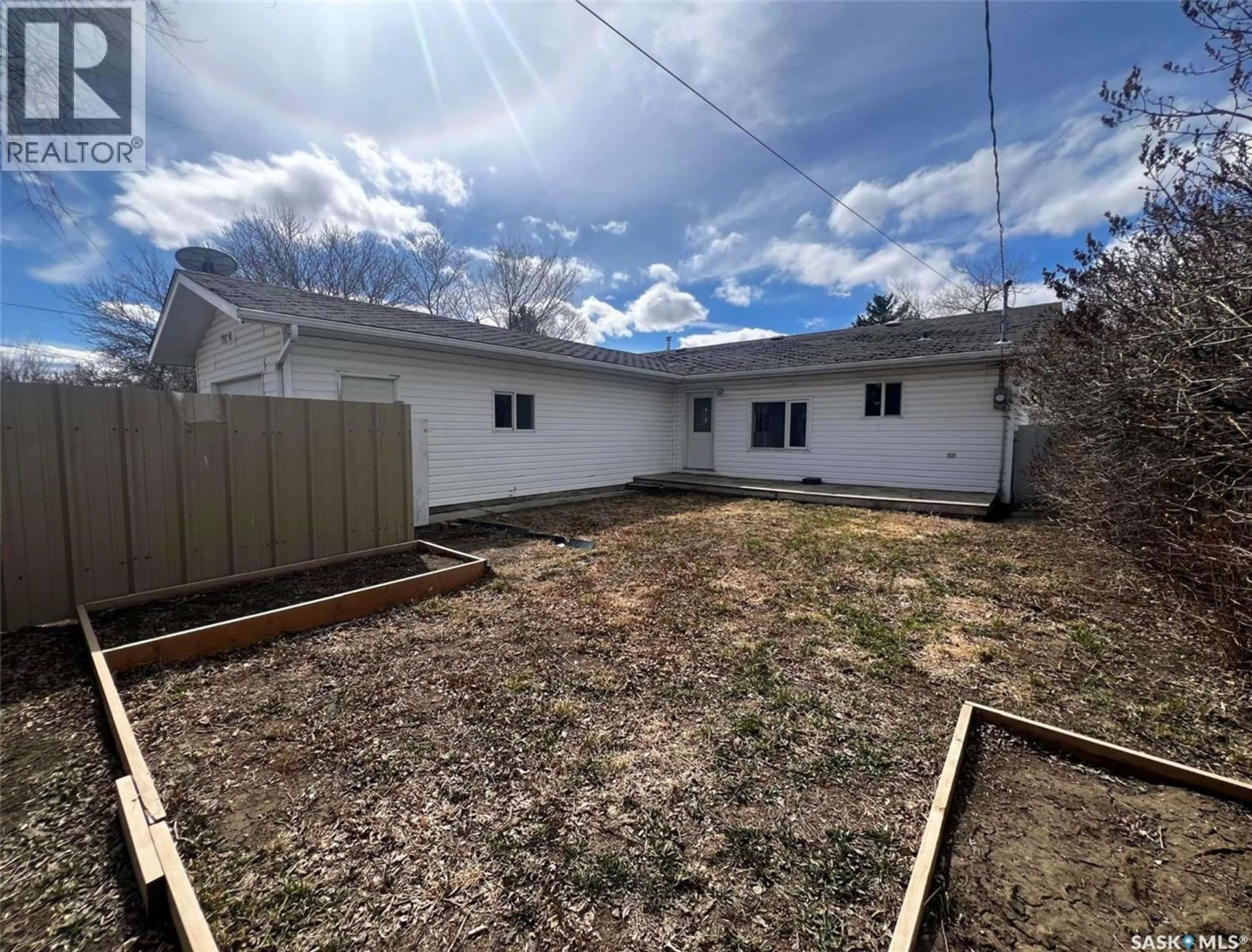 A pic from outside/outdoor area/front of a property/back of a property/a pic from drone, unknown for 349 10TH AVENUE, Swift Current Saskatchewan S9H1P1