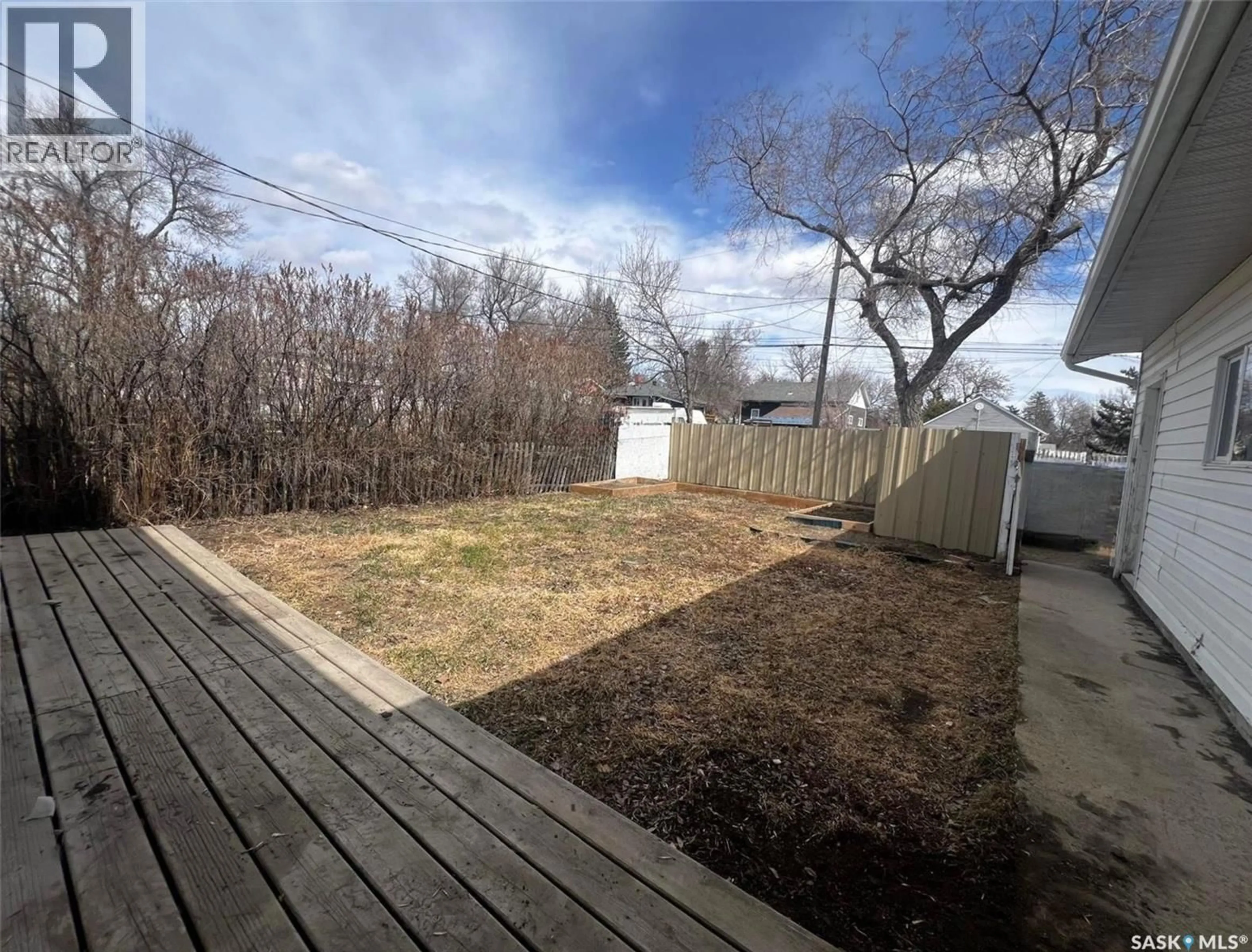 A pic from outside/outdoor area/front of a property/back of a property/a pic from drone, unknown for 349 10TH AVENUE, Swift Current Saskatchewan S9H1P1
