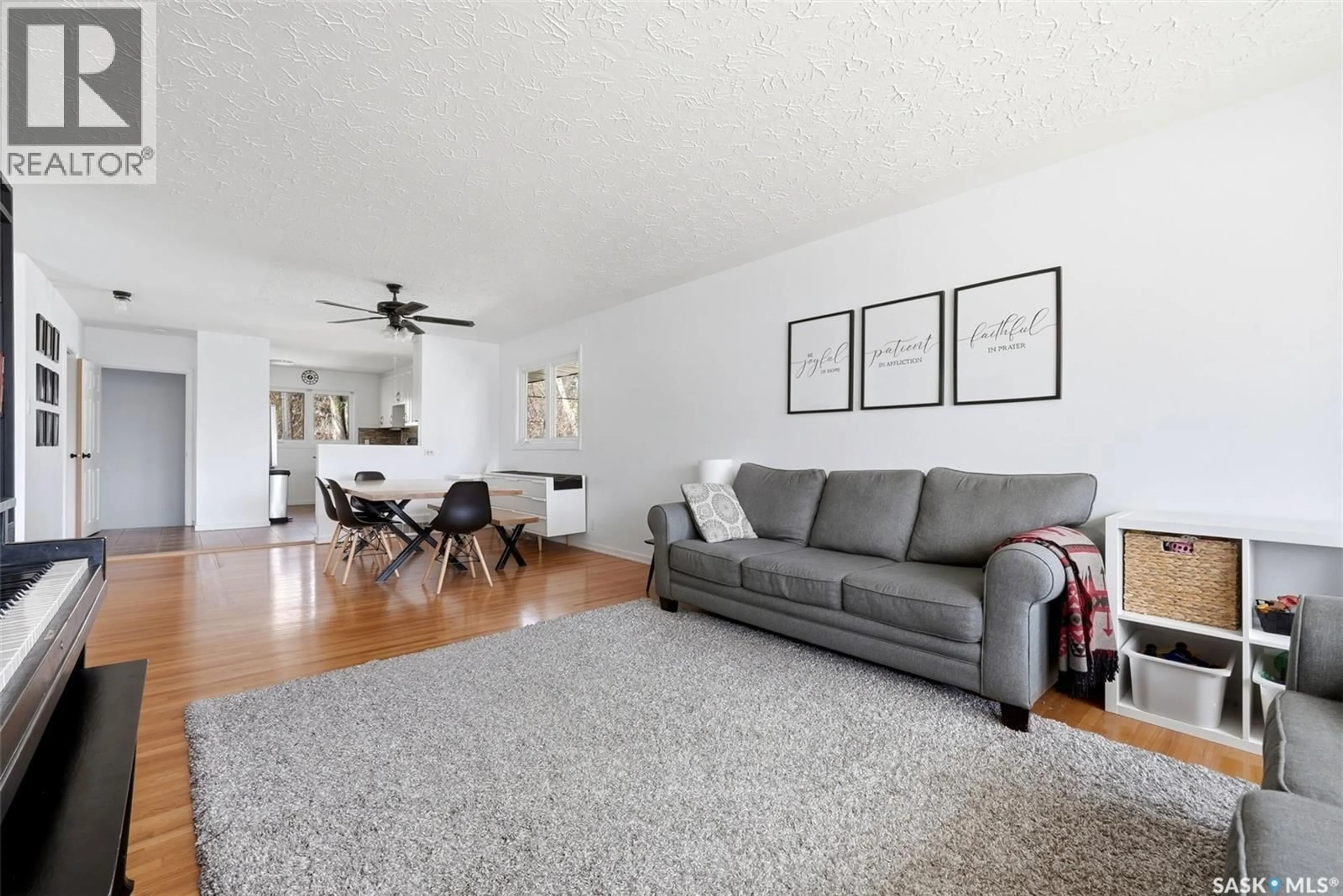 Living room with furniture, unknown for 115 KNOWLES CRESCENT, Regina Saskatchewan S4S4P3