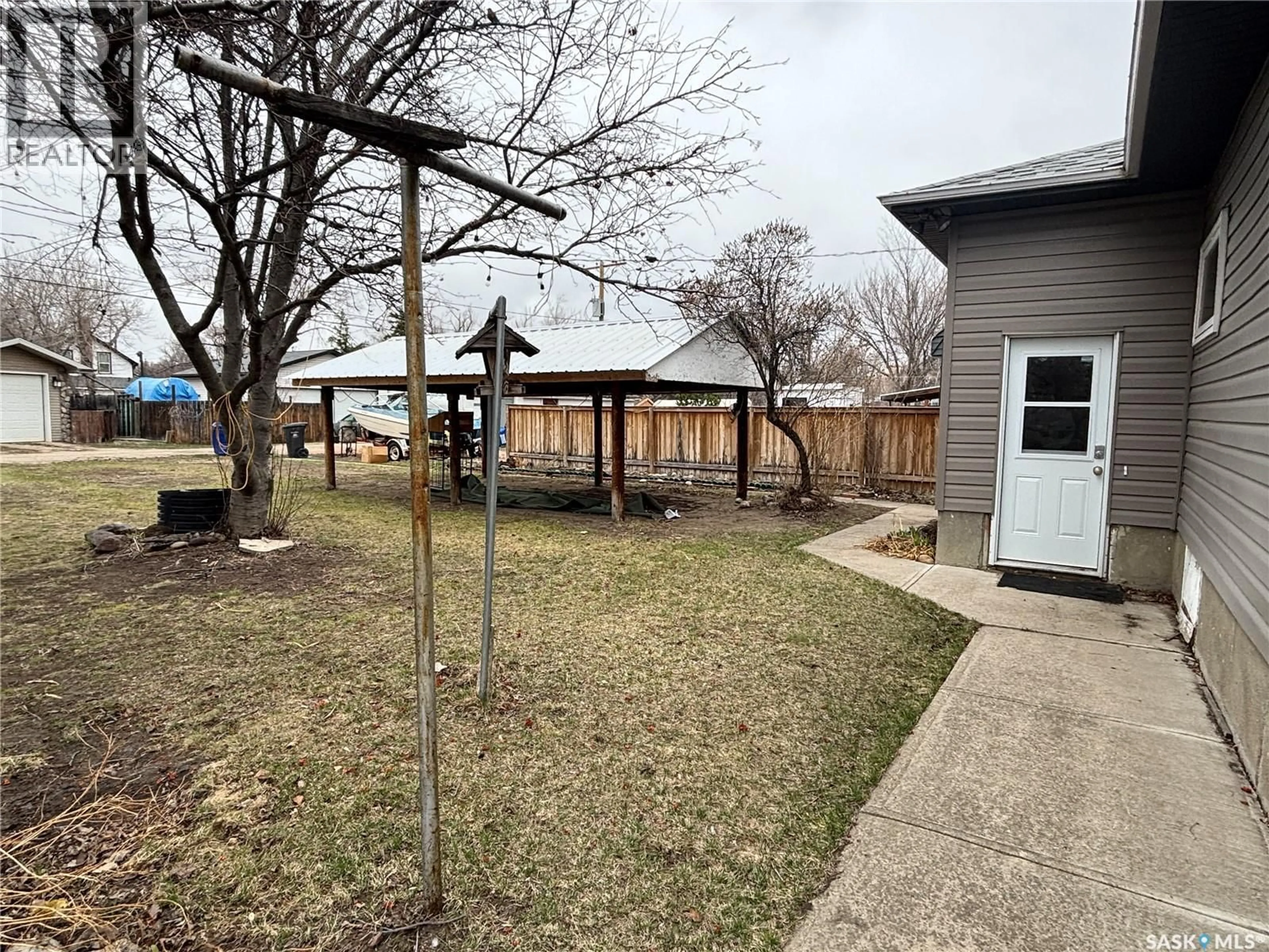 A pic from outside/outdoor area/front of a property/back of a property/a pic from drone, street for 413 MAPLE STREET, Maple Creek Saskatchewan S0N1N0
