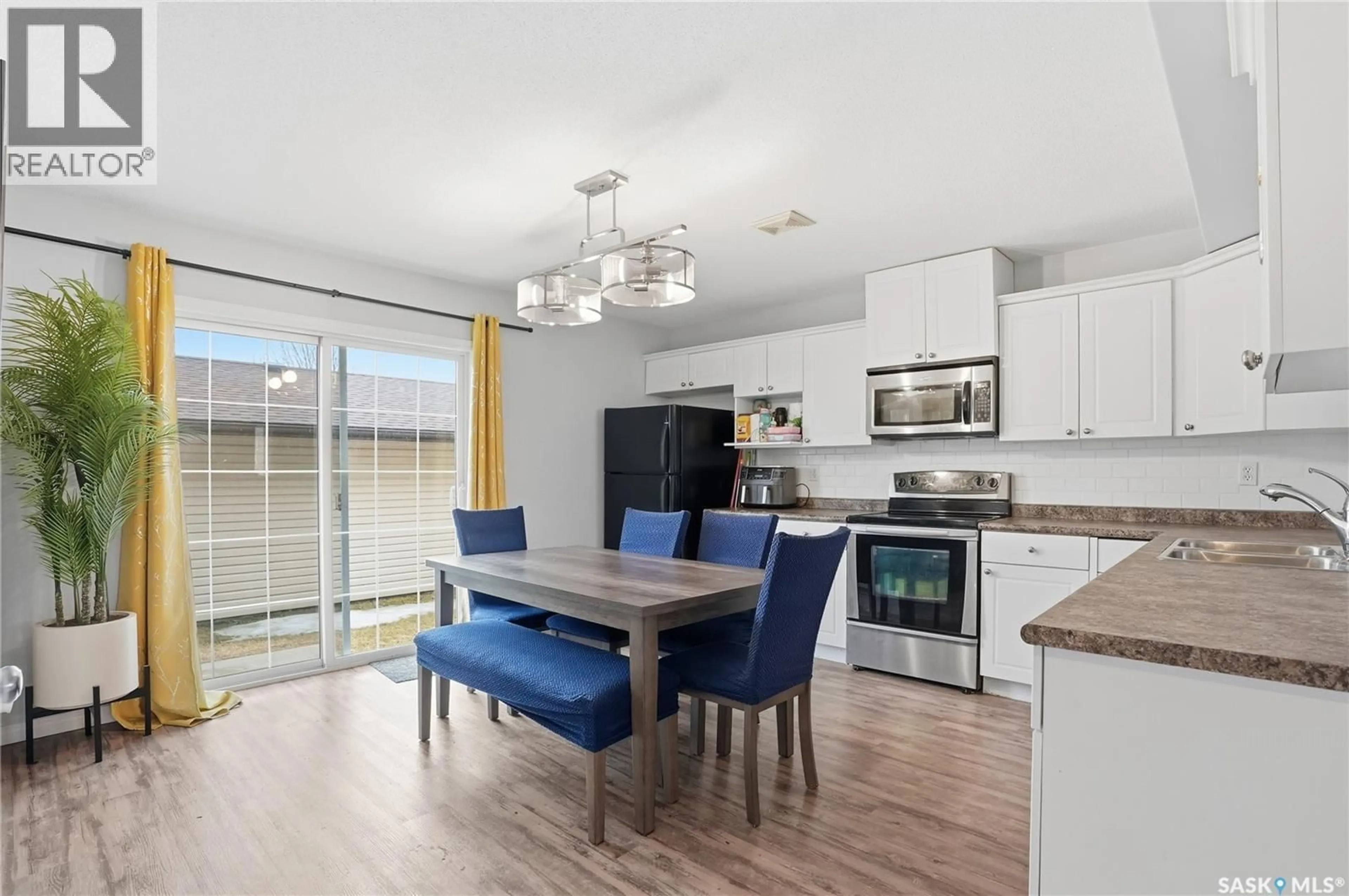 Open concept kitchen, unknown for 23 135 KEEDWELL STREET, Saskatoon Saskatchewan S7W0A3