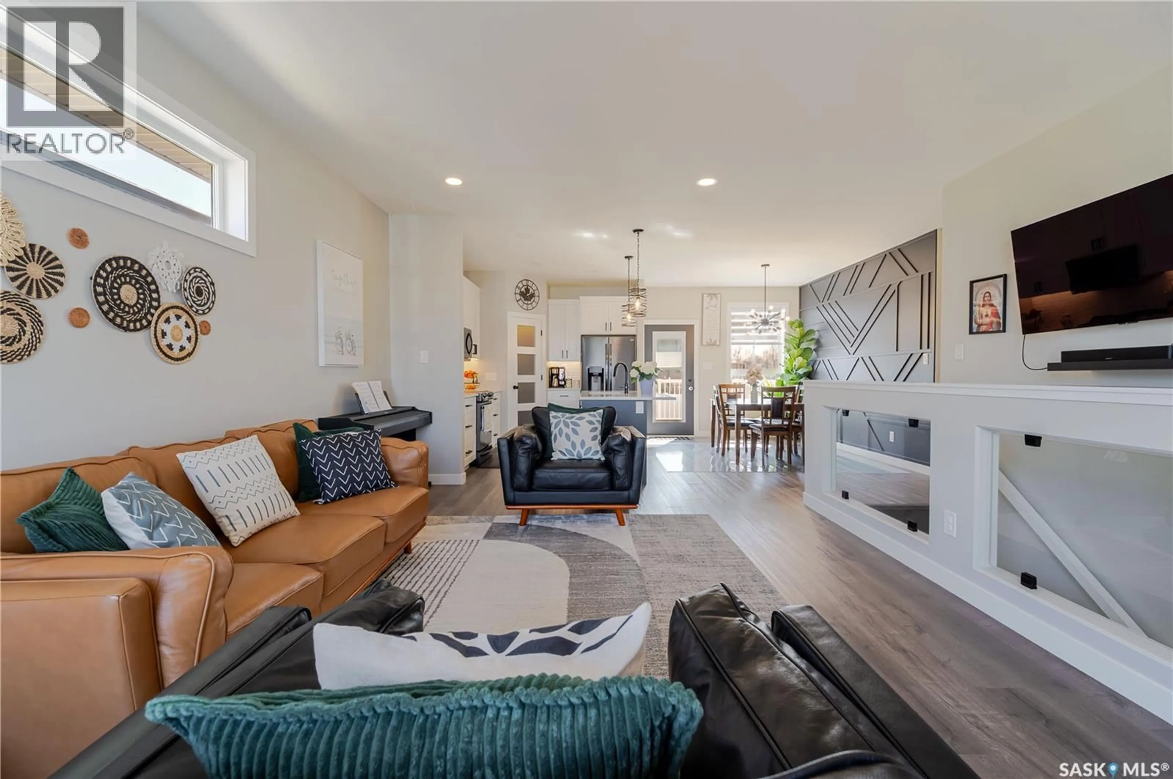 Living room with furniture, ceramic/tile floor for 1007 MAPLEWOOD DRIVE, Moose Jaw Saskatchewan S6J0B6