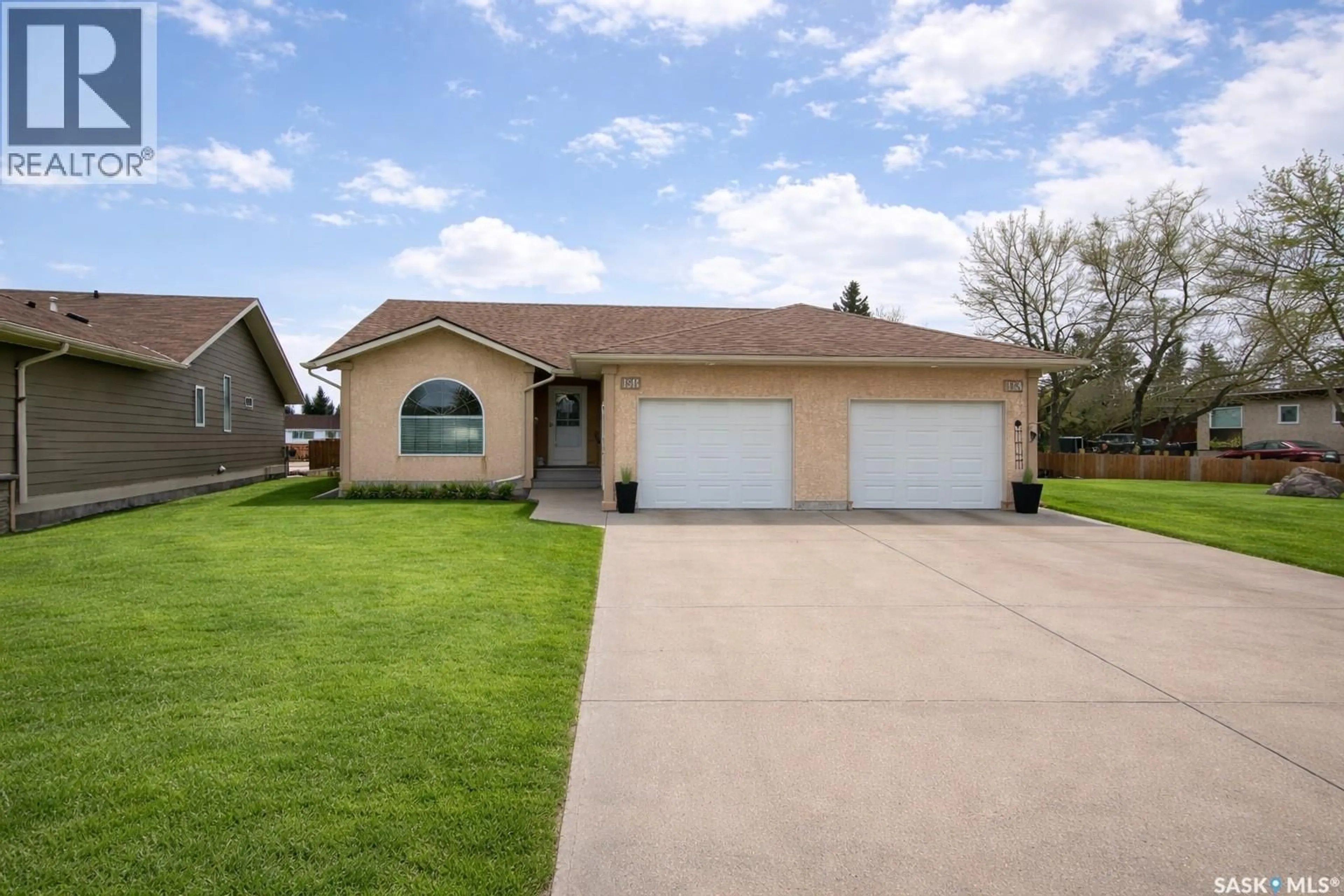 Home with vinyl exterior material, street for 15B DOWNING DRIVE, Lanigan Saskatchewan S0K2M0