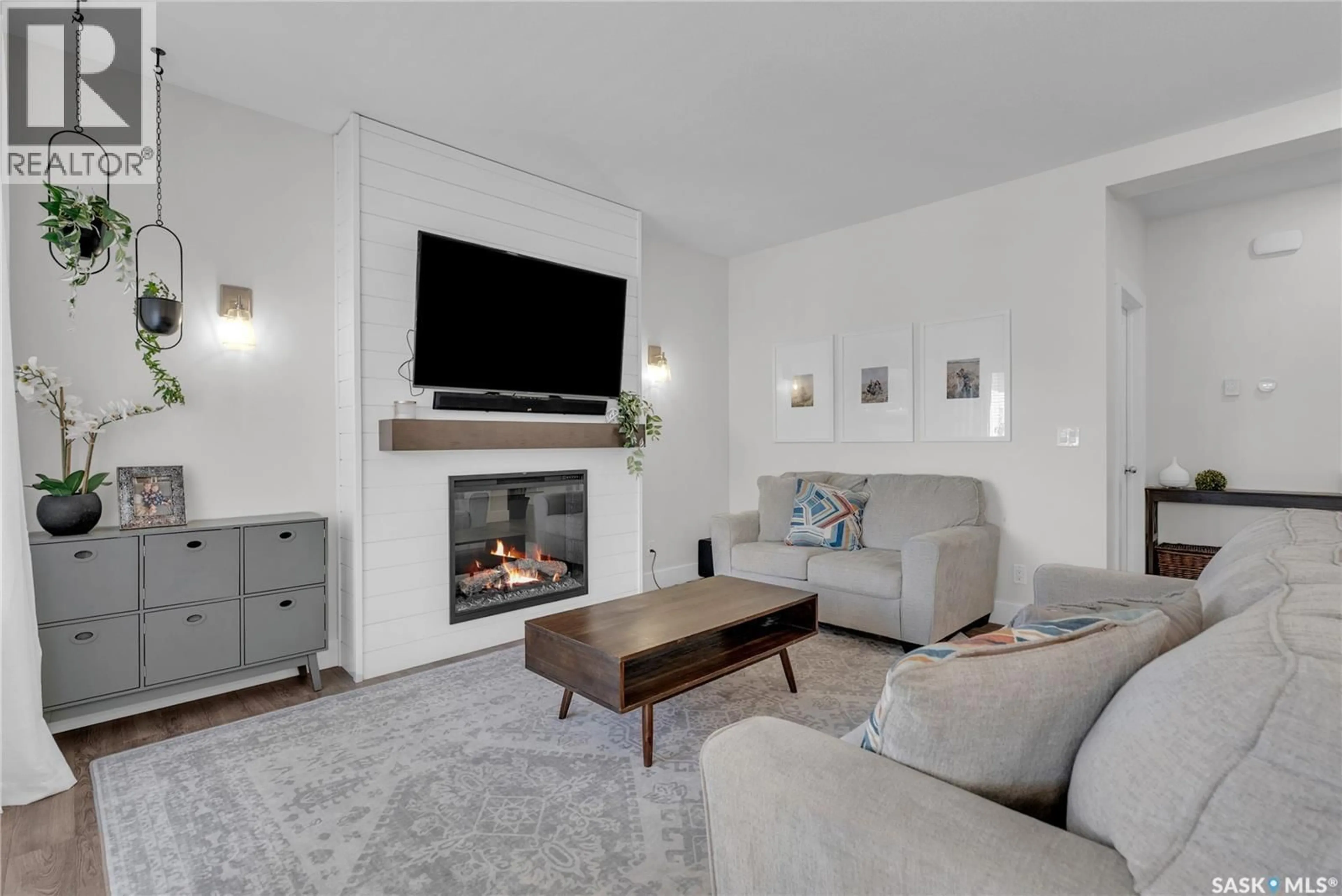 Living room with furniture, unknown for 1235 PRINGLE WAY, Saskatoon Saskatchewan S7T0V4