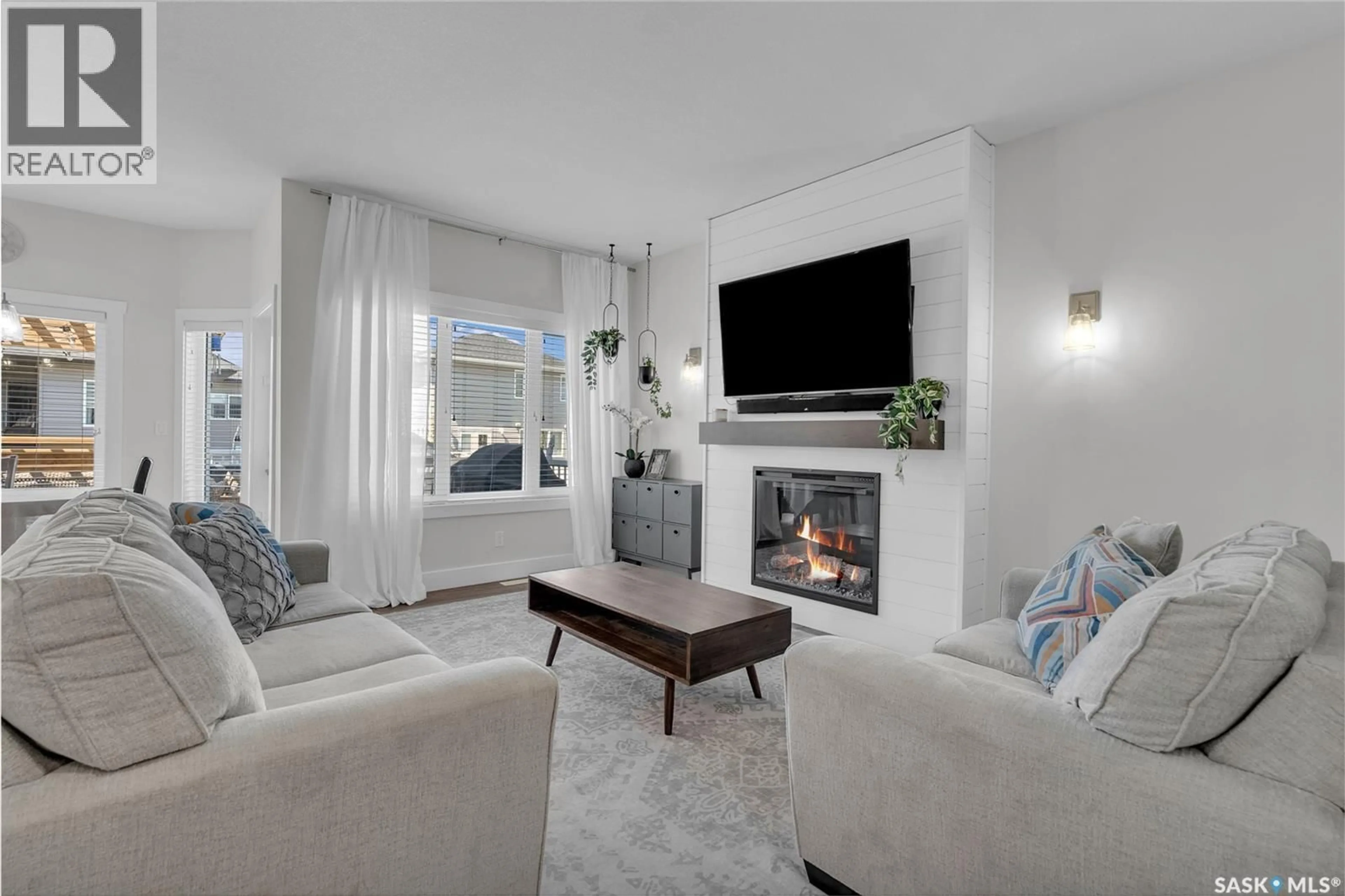 Living room with furniture, unknown for 1235 PRINGLE WAY, Saskatoon Saskatchewan S7T0V4