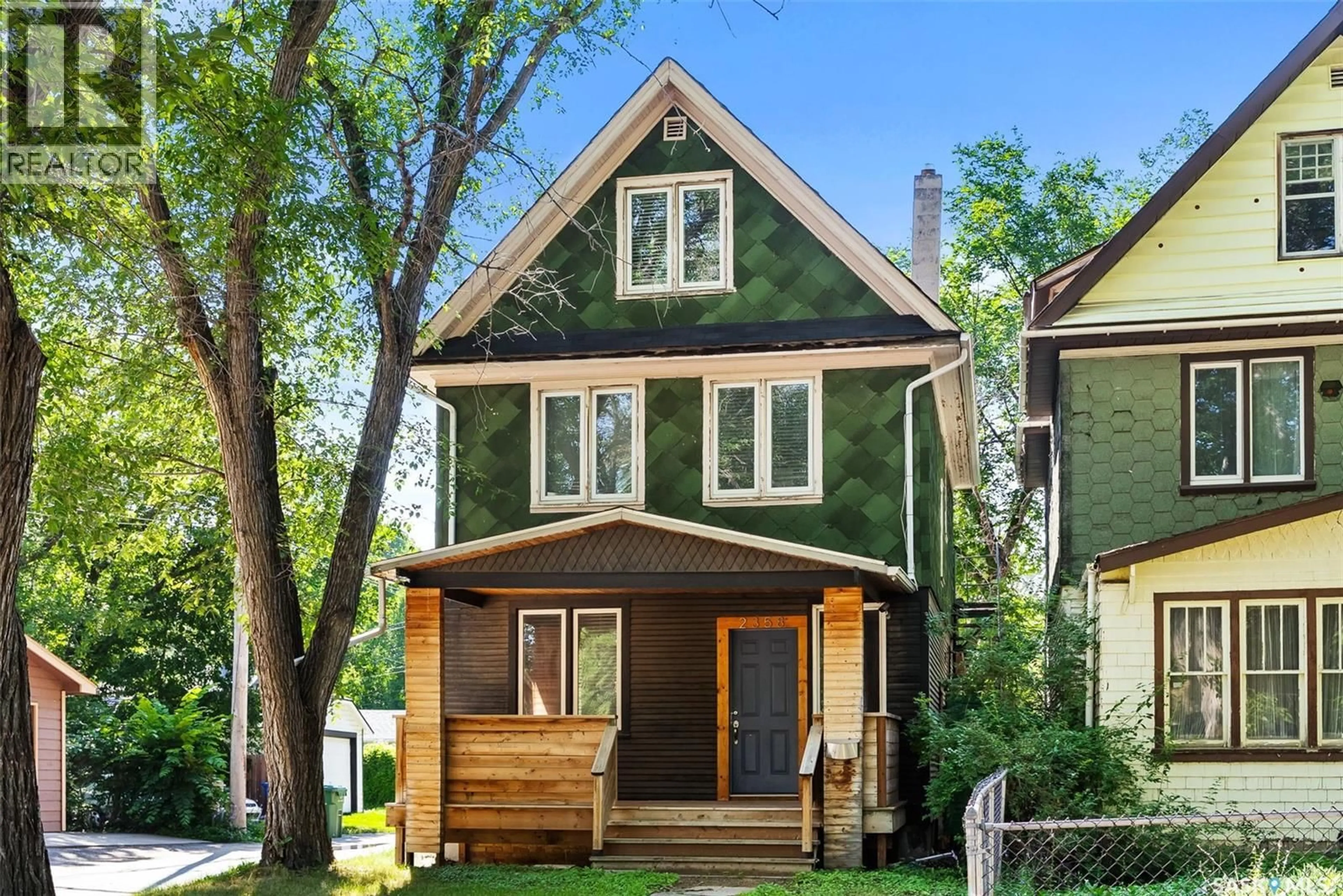 Home with vinyl exterior material, street for 2358 MONTREAL STREET, Regina Saskatchewan S4P1L8