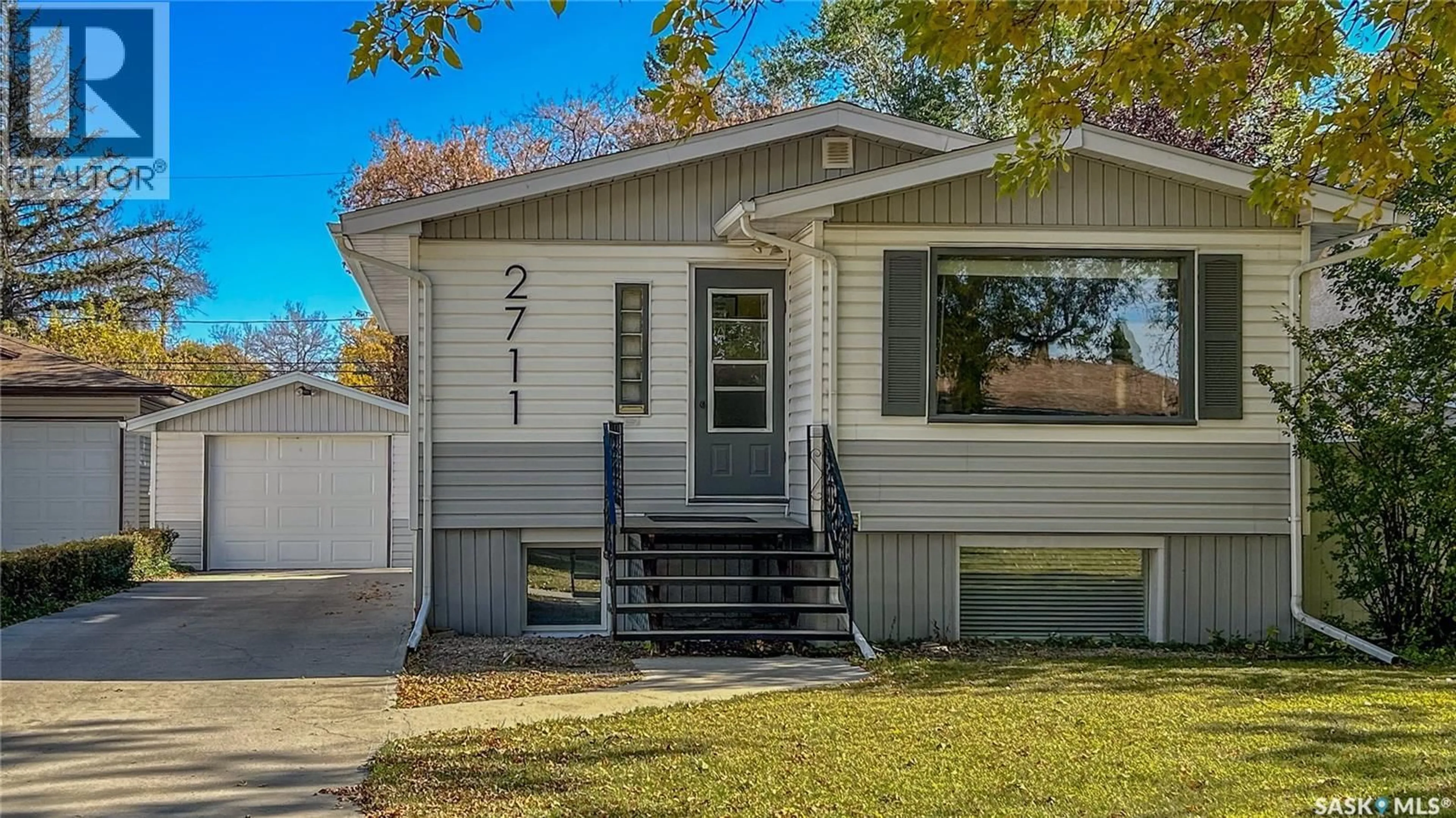 Home with vinyl exterior material, street for 2711 MONTREAL CRESCENT, Regina Saskatchewan S4P2W4