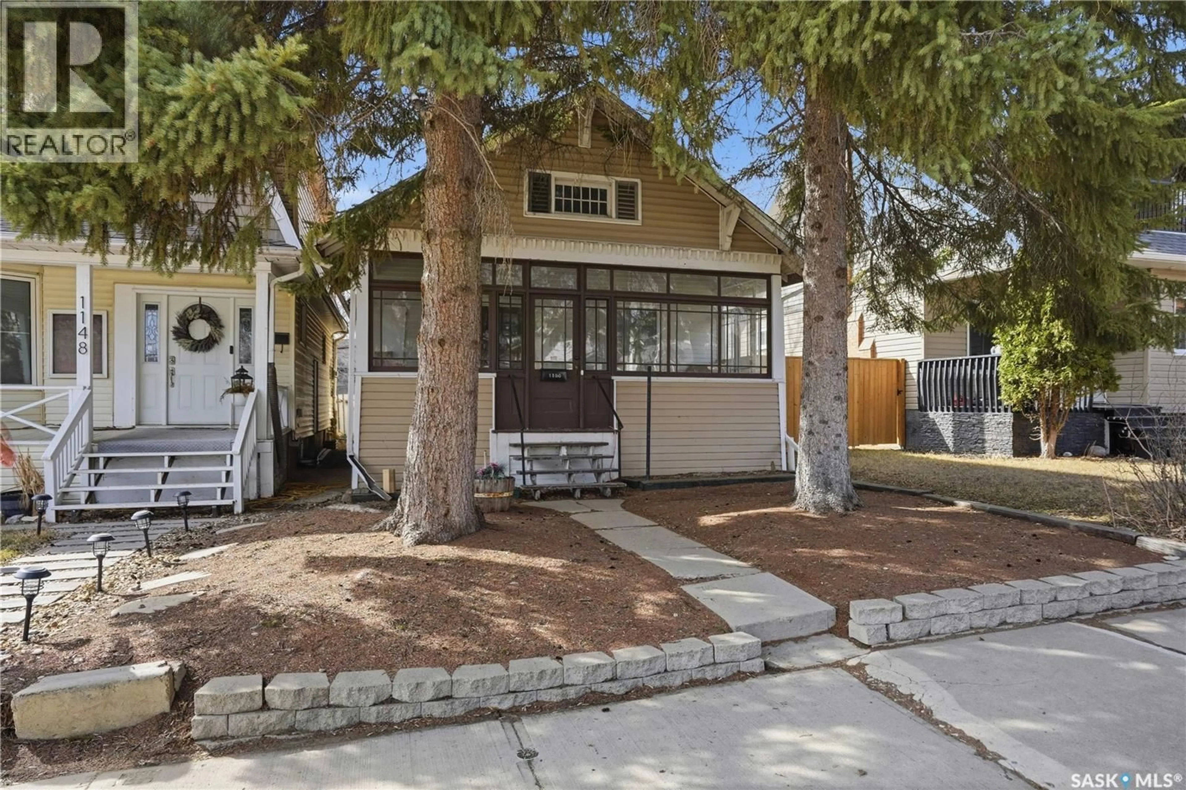 Home with vinyl exterior material, street for 1150 3RD AVENUE, Moose Jaw Saskatchewan S6H1G1