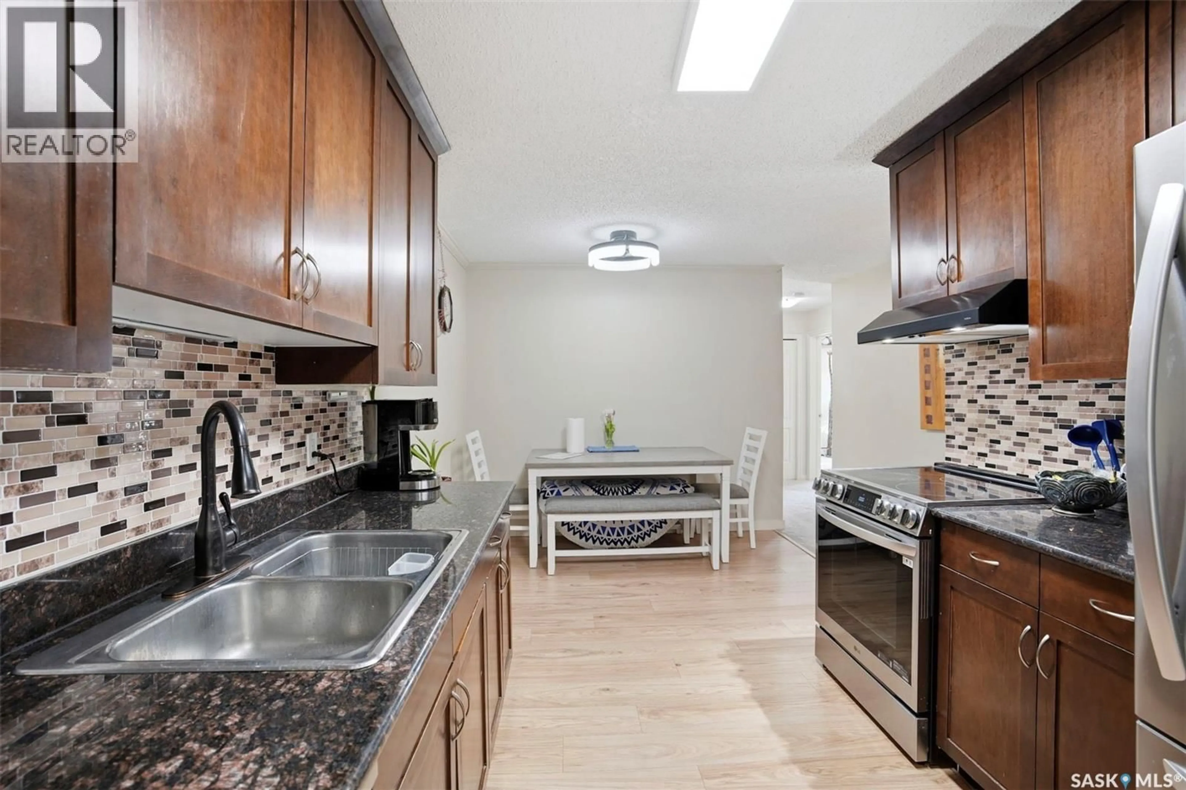 Standard kitchen, ceramic/tile floor for 2233 - 219 ST HENRY AVENUE, Saskatoon Saskatchewan S7M5K6