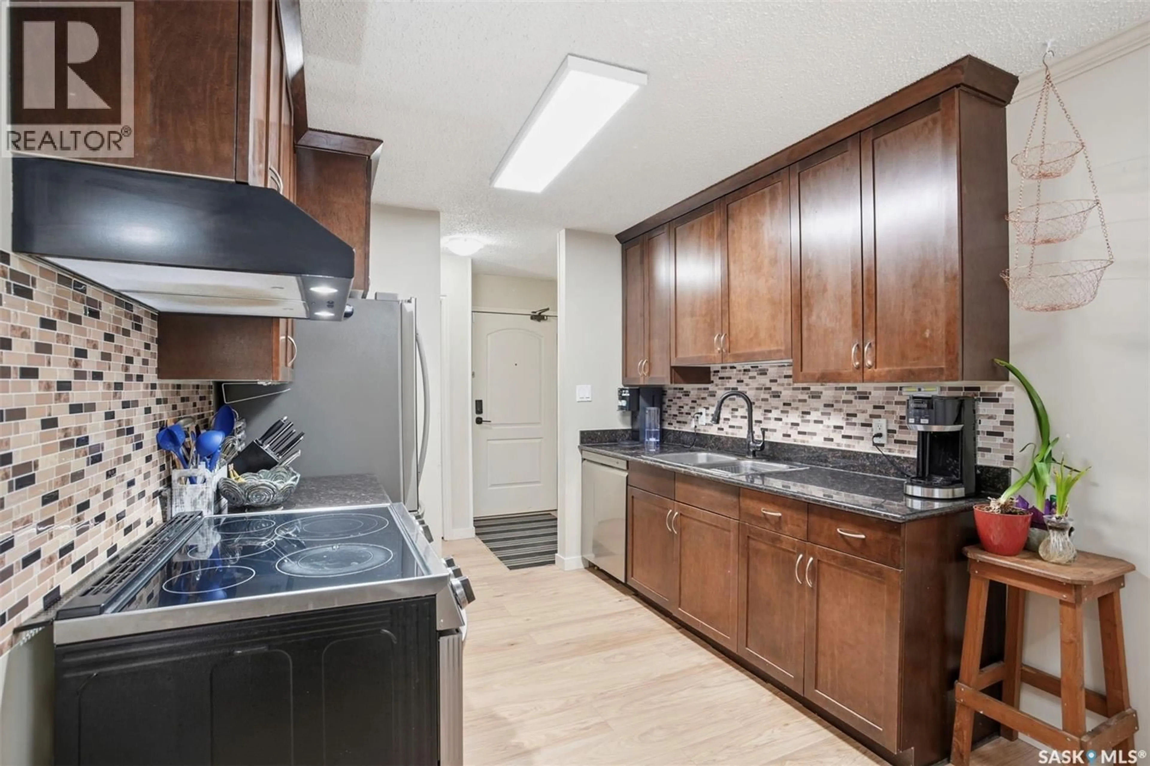 Standard kitchen, ceramic/tile floor for 2233 - 219 ST HENRY AVENUE, Saskatoon Saskatchewan S7M5K6
