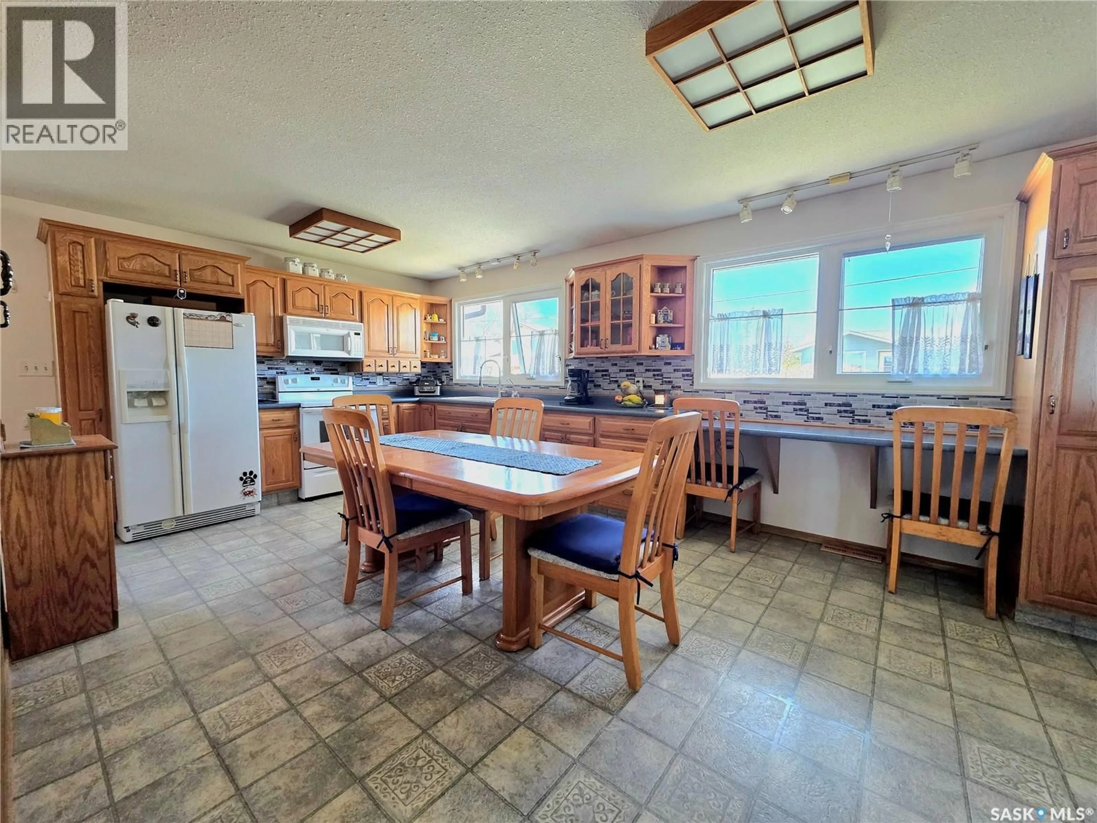 Open concept kitchen, ceramic/tile floor for 101 FRASER AVENUE, Oxbow Saskatchewan S0C0B6