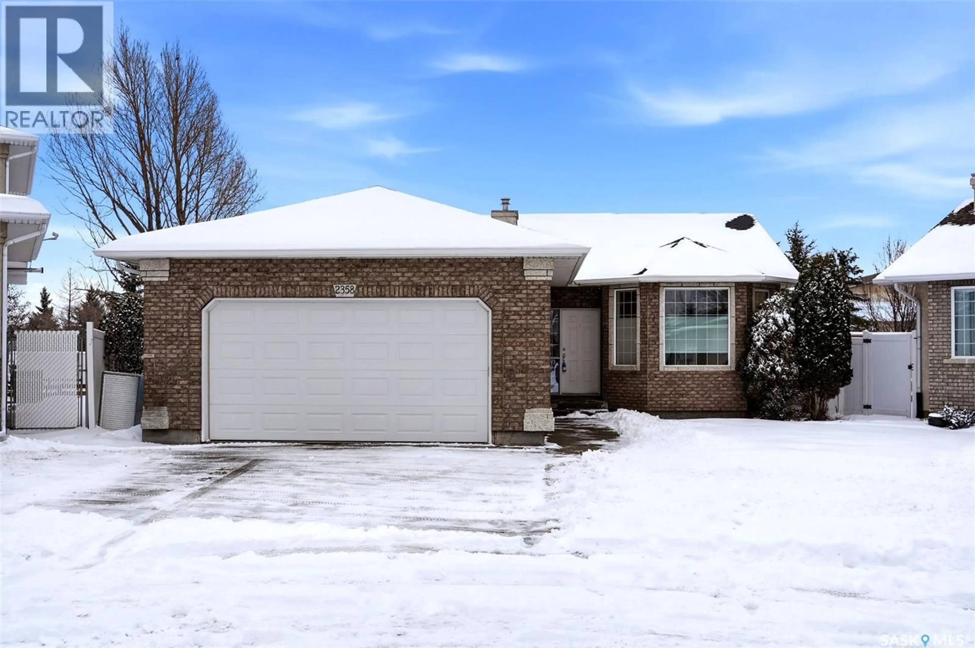 Home with brick exterior material, street for 2358 MCGREGOR PLACE, Regina Saskatchewan S4V2Y4