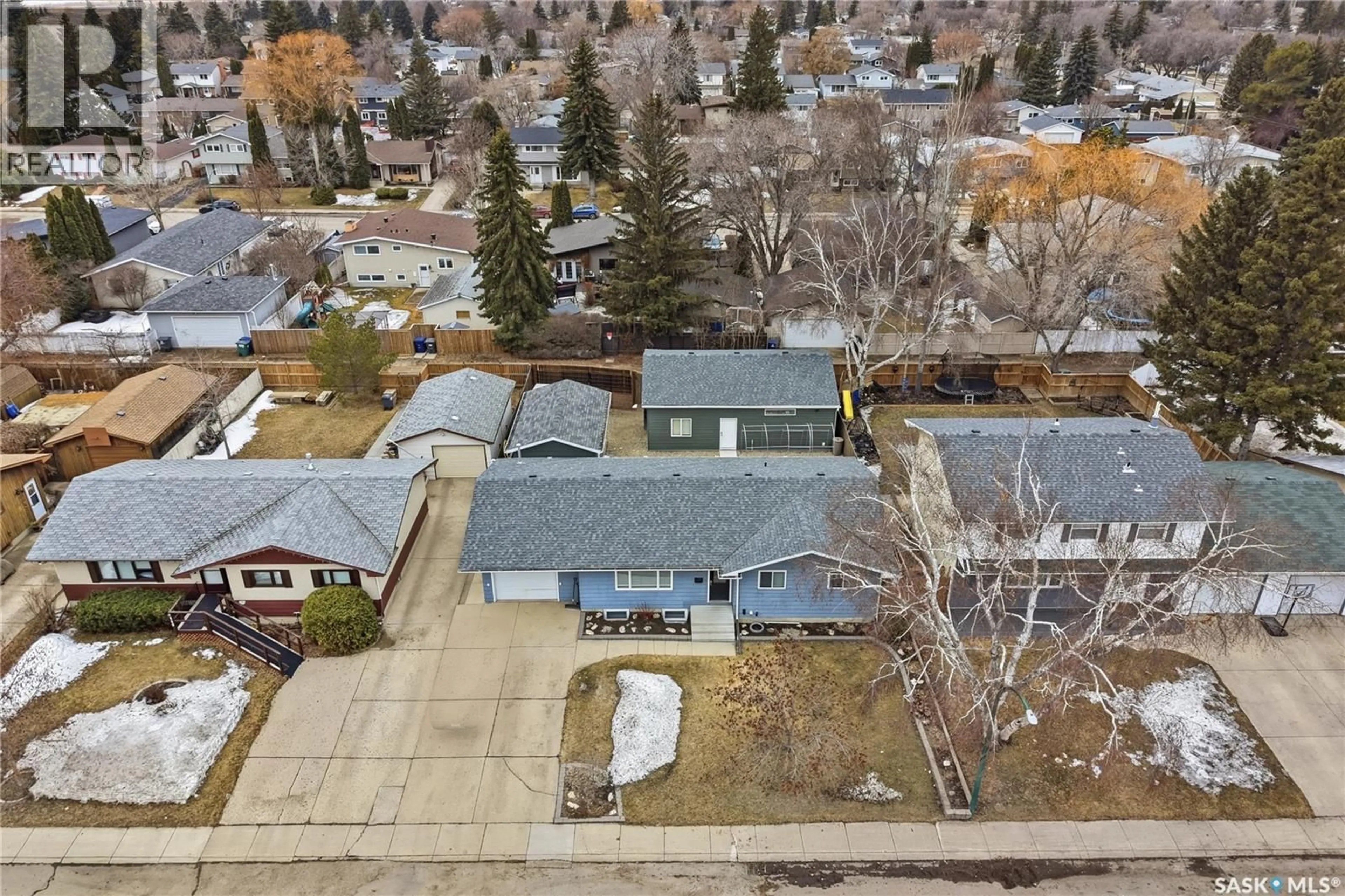 A pic from outside/outdoor area/front of a property/back of a property/a pic from drone, street for 123 DEBORAH CRESCENT, Saskatoon Saskatchewan S7J2W9