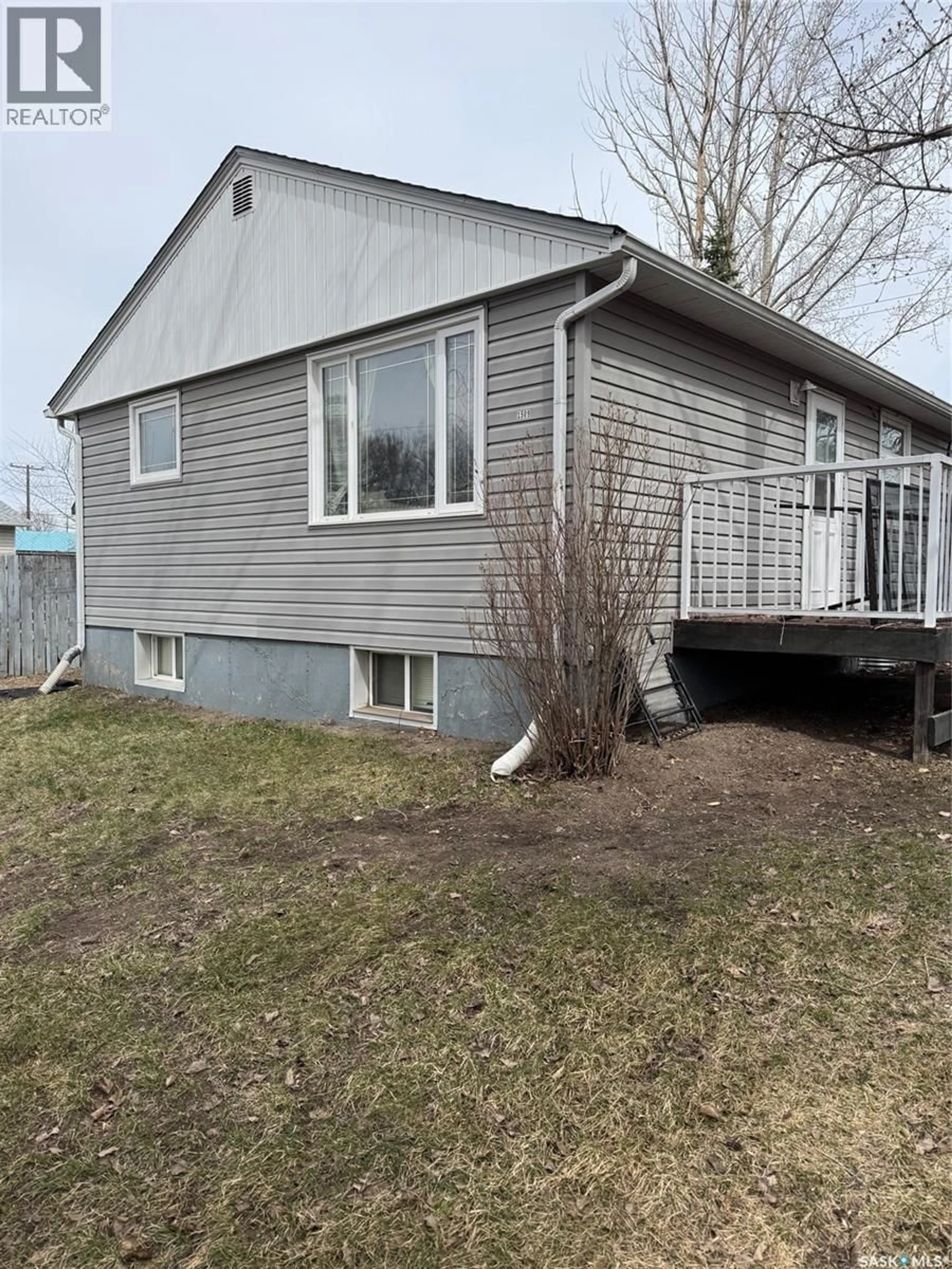 Home with vinyl exterior material, street for 1509 YOUNG STREET, Estevan Saskatchewan S4A0J5