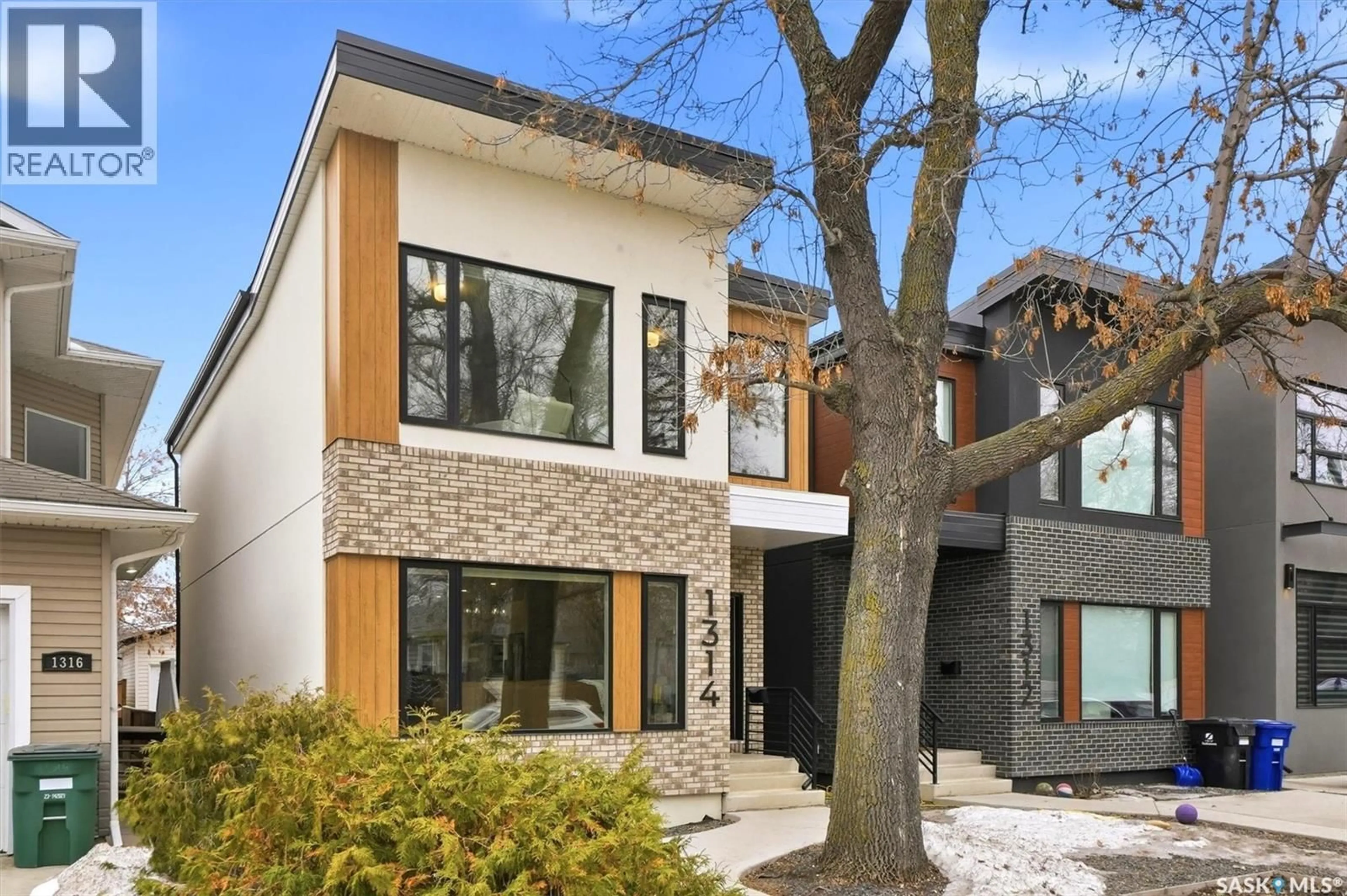 Home with brick exterior material, street for 1314 EMPRESS AVENUE, Saskatoon Saskatchewan S7K3G1