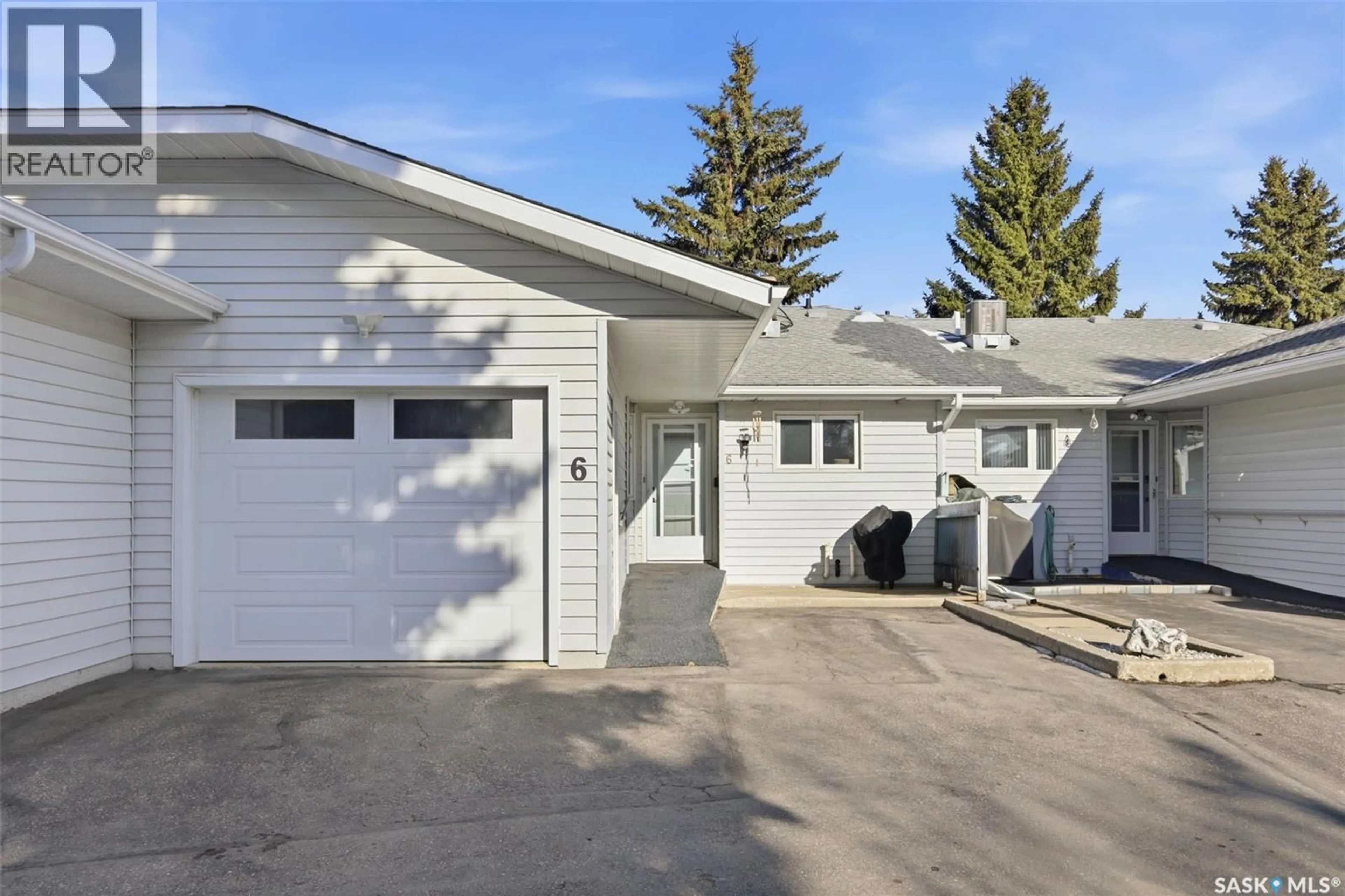 Home with vinyl exterior material, street for 80 - 6 BERINI DRIVE, Saskatoon Saskatchewan S7N3P8