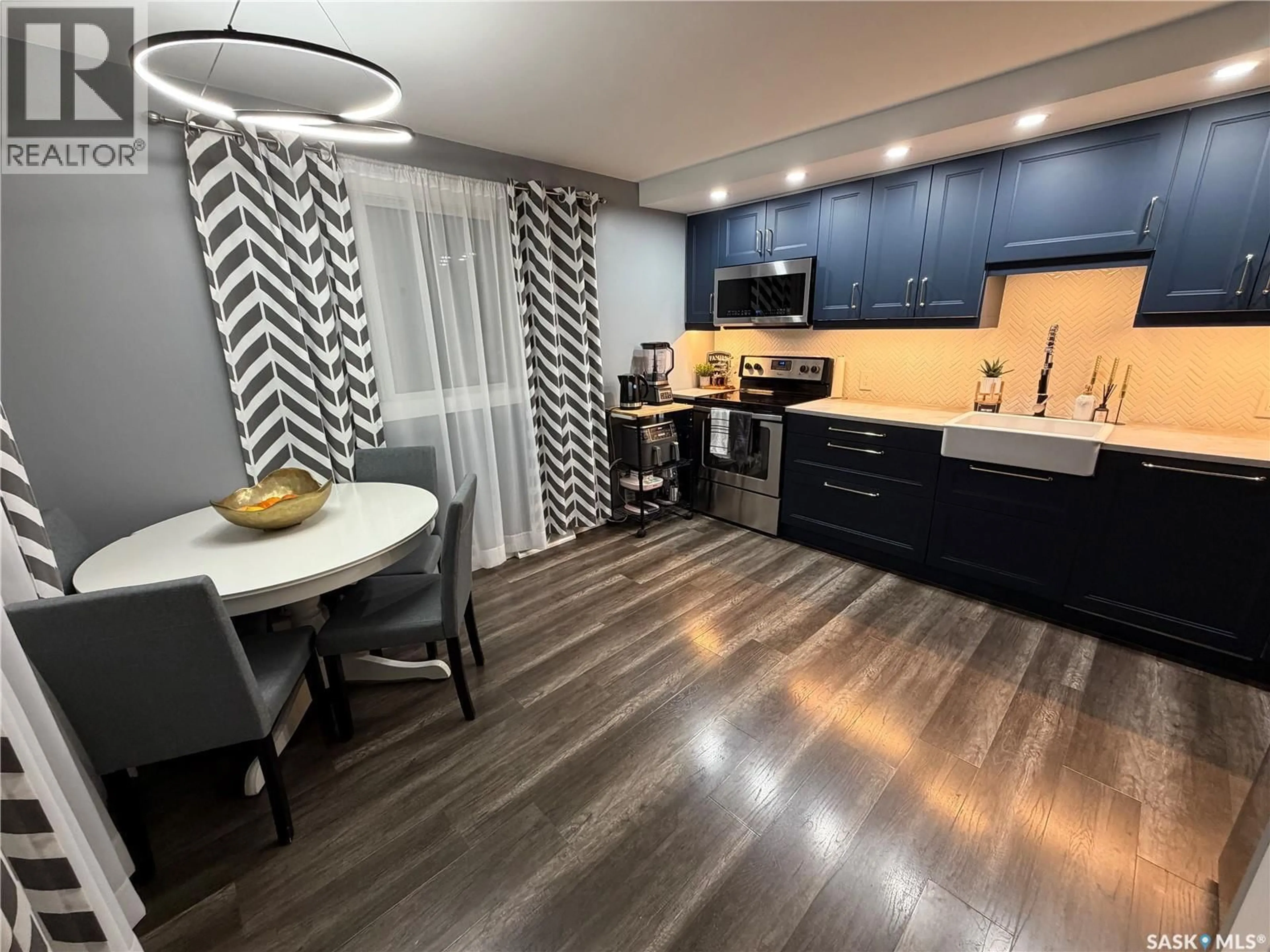 Open concept kitchen, unknown for 1128 SIDNEY STREET, Swift Current Saskatchewan S9H1T9