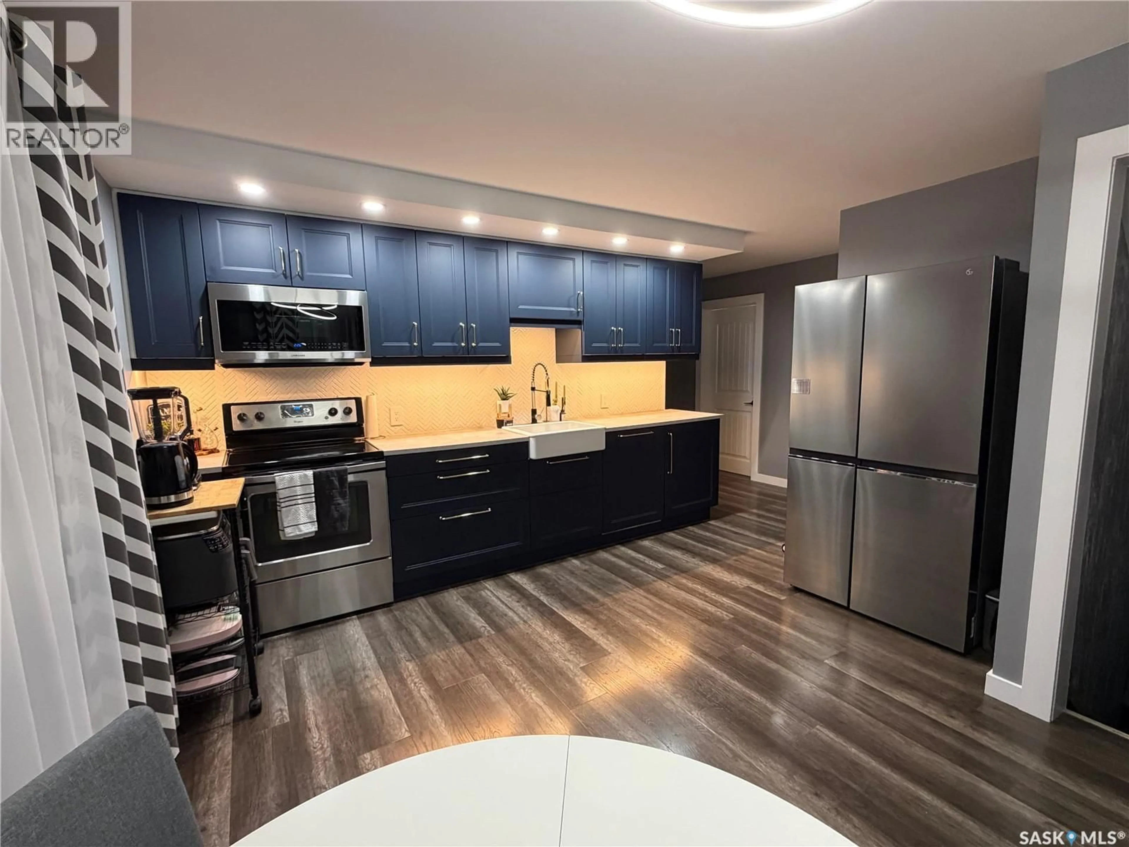 Open concept kitchen, unknown for 1128 SIDNEY STREET, Swift Current Saskatchewan S9H1T9