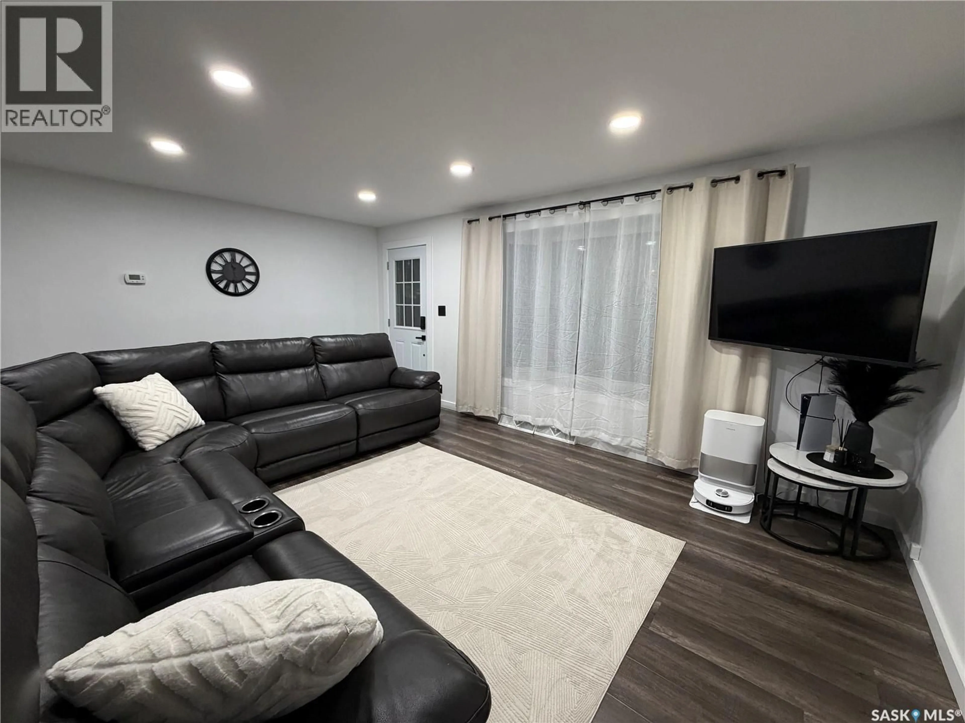 Living room with furniture, unknown for 1128 SIDNEY STREET, Swift Current Saskatchewan S9H1T9