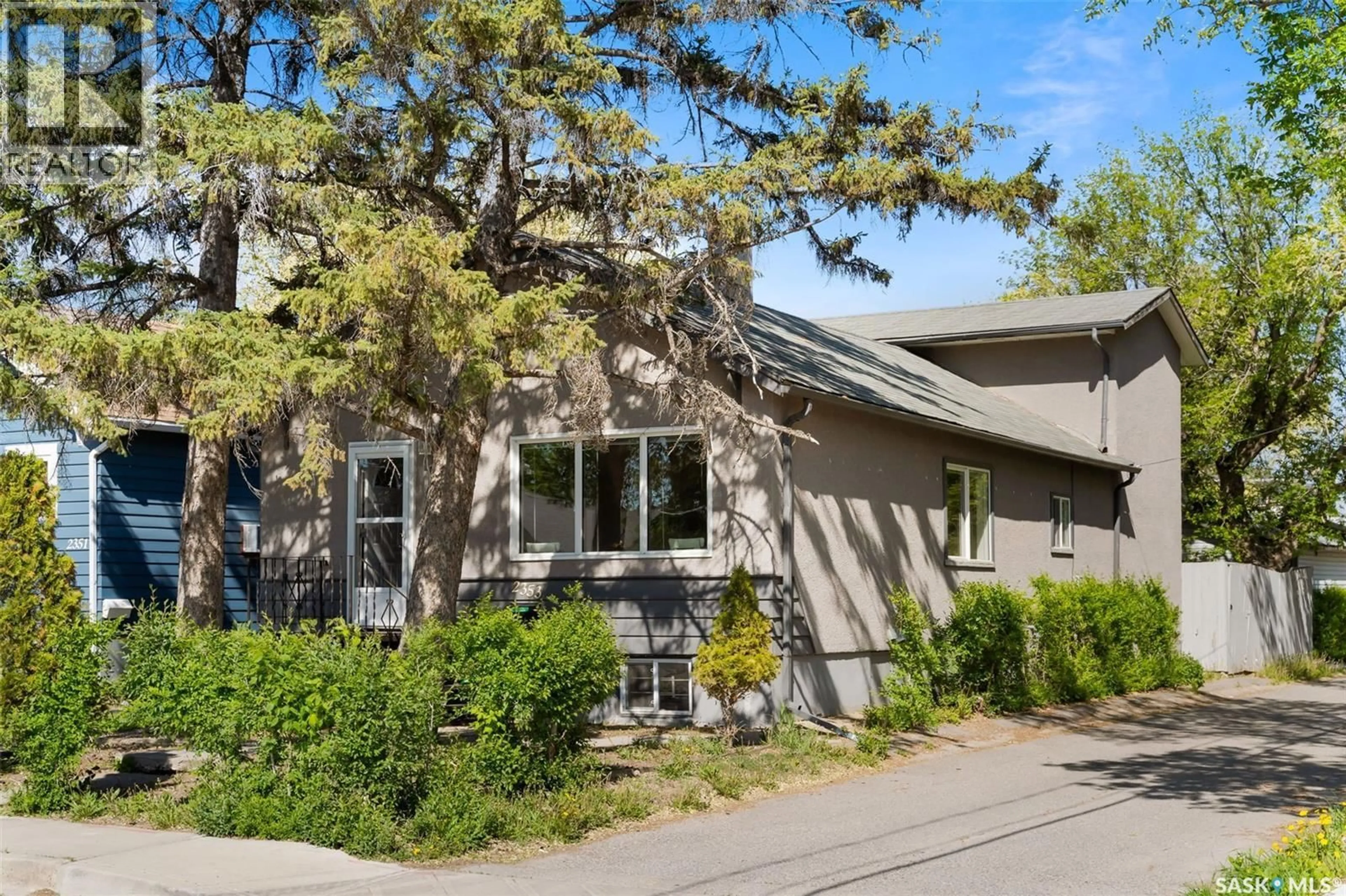 Home with vinyl exterior material, street for 2353 REYNOLDS STREET, Regina Saskatchewan S4N3N6