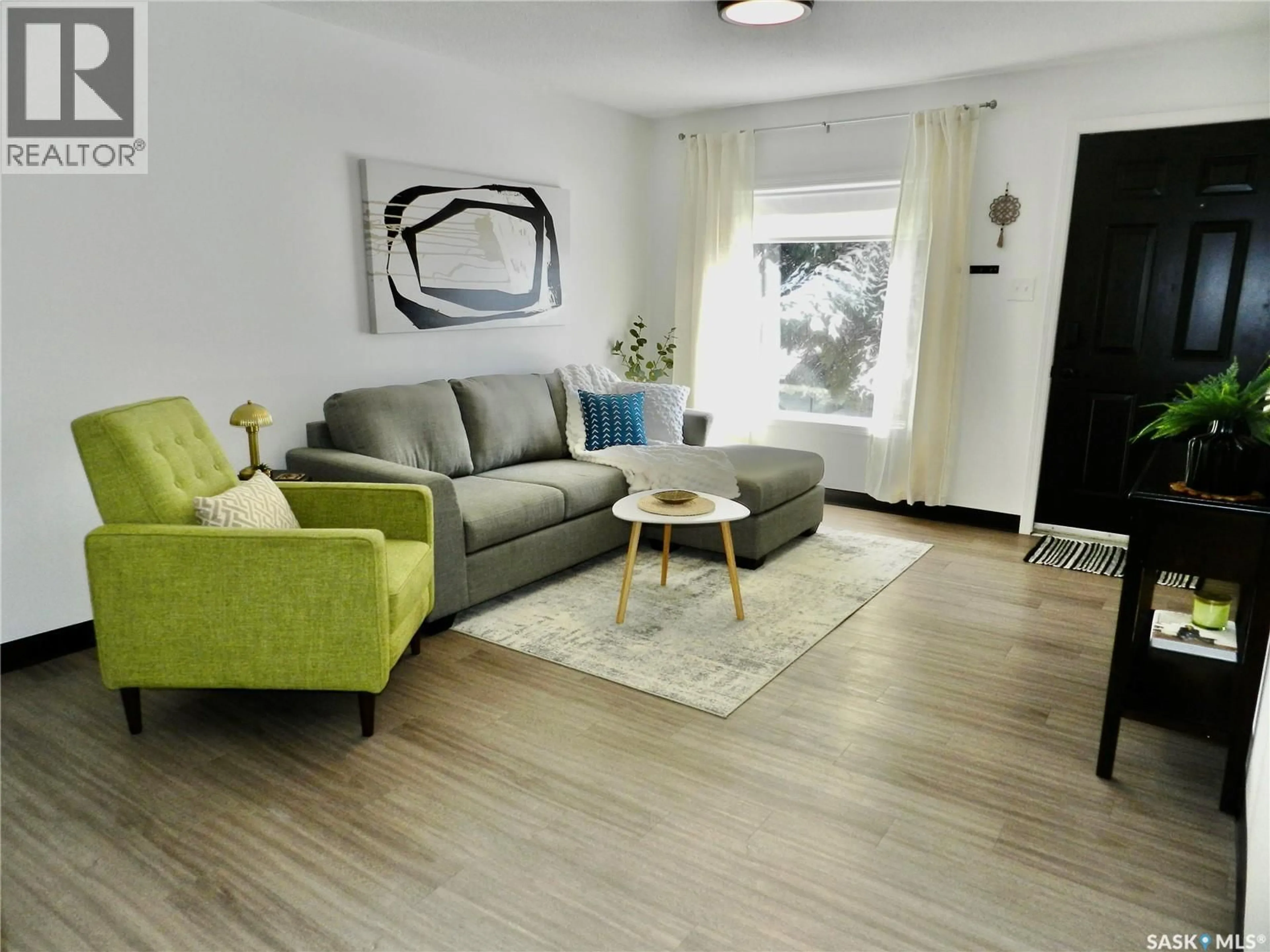 Living room with furniture, unknown for 1030 HOCHELAGA STREET, Moose Jaw Saskatchewan S6H2H9