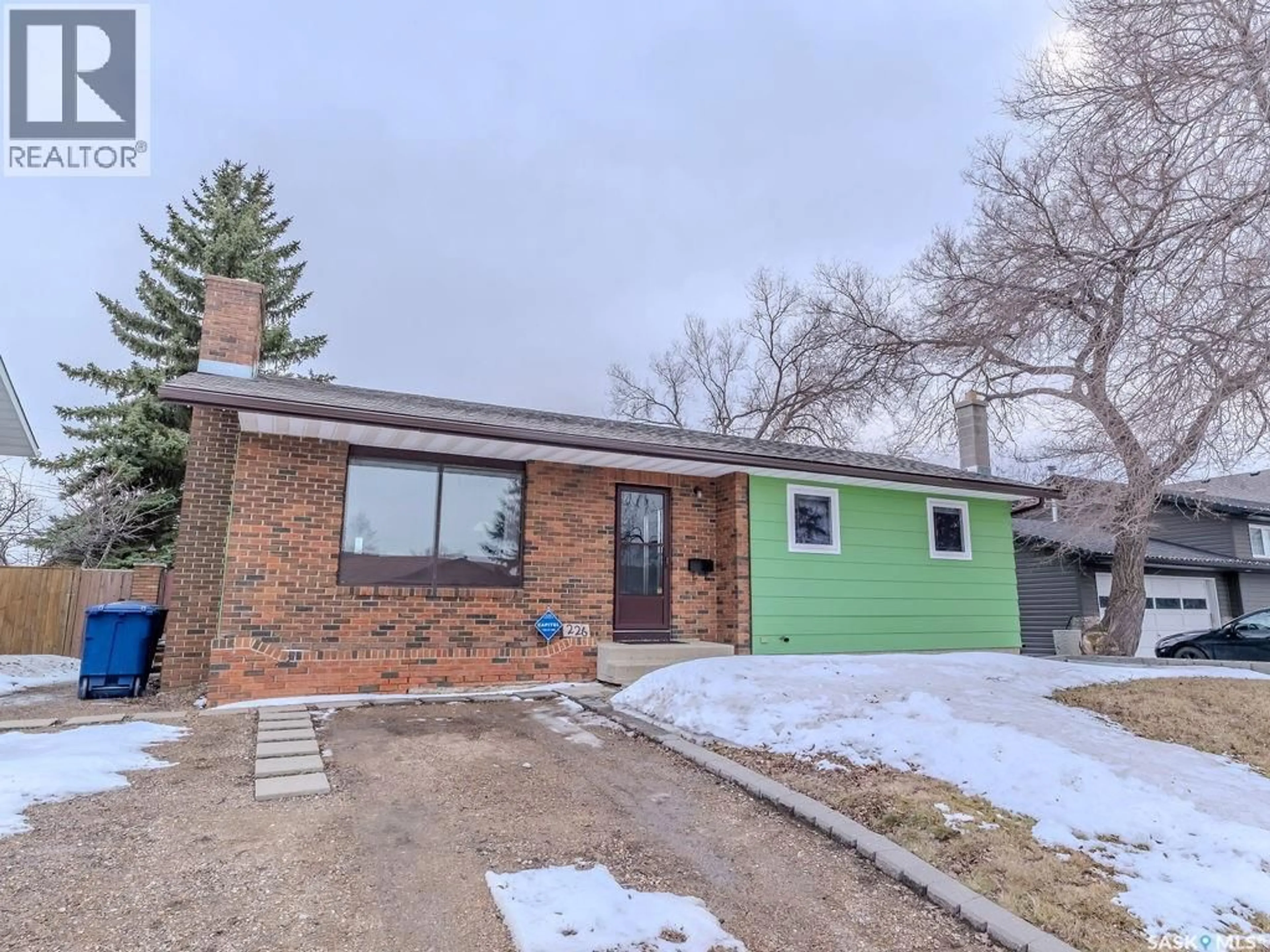 Home with brick exterior material, street for 226 1ST STREET, Martensville Saskatchewan S0K2T0