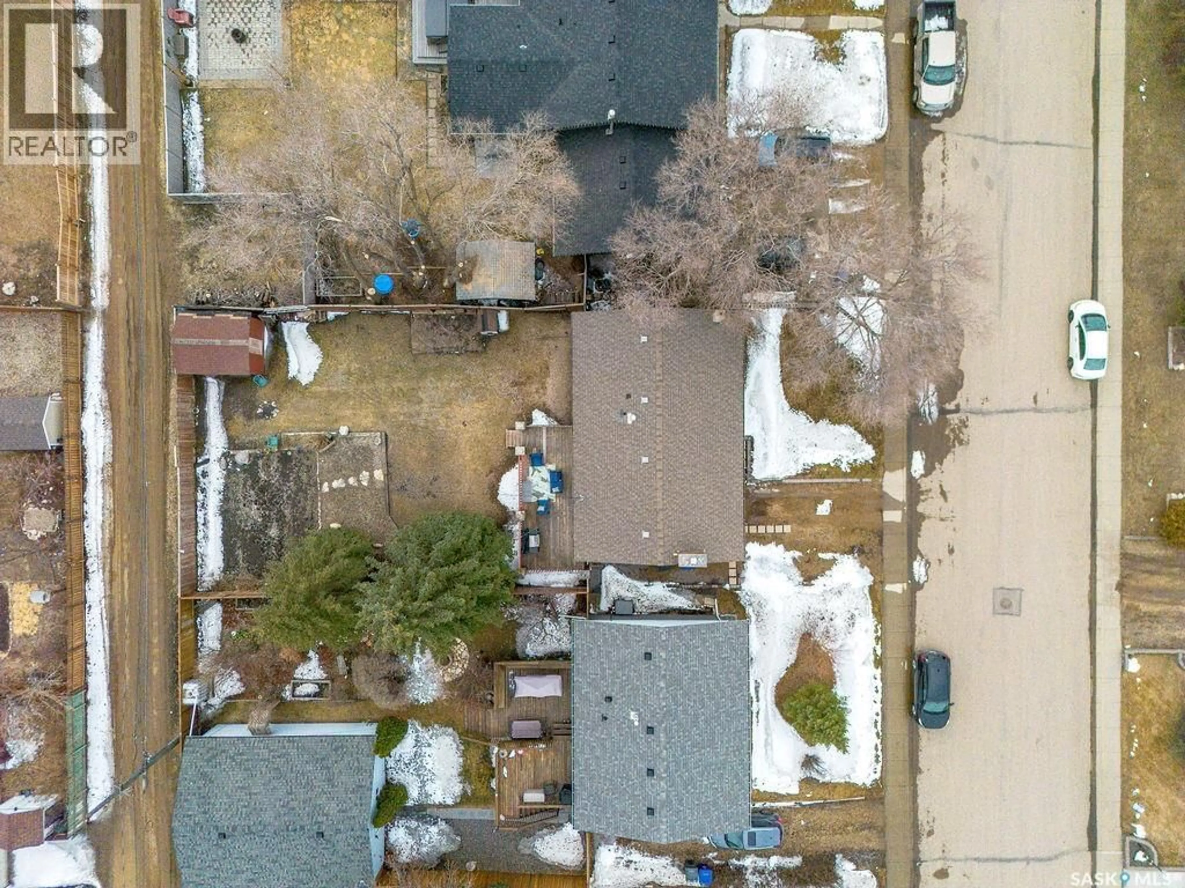 A pic from outside/outdoor area/front of a property/back of a property/a pic from drone, street for 226 1ST STREET, Martensville Saskatchewan S0K2T0