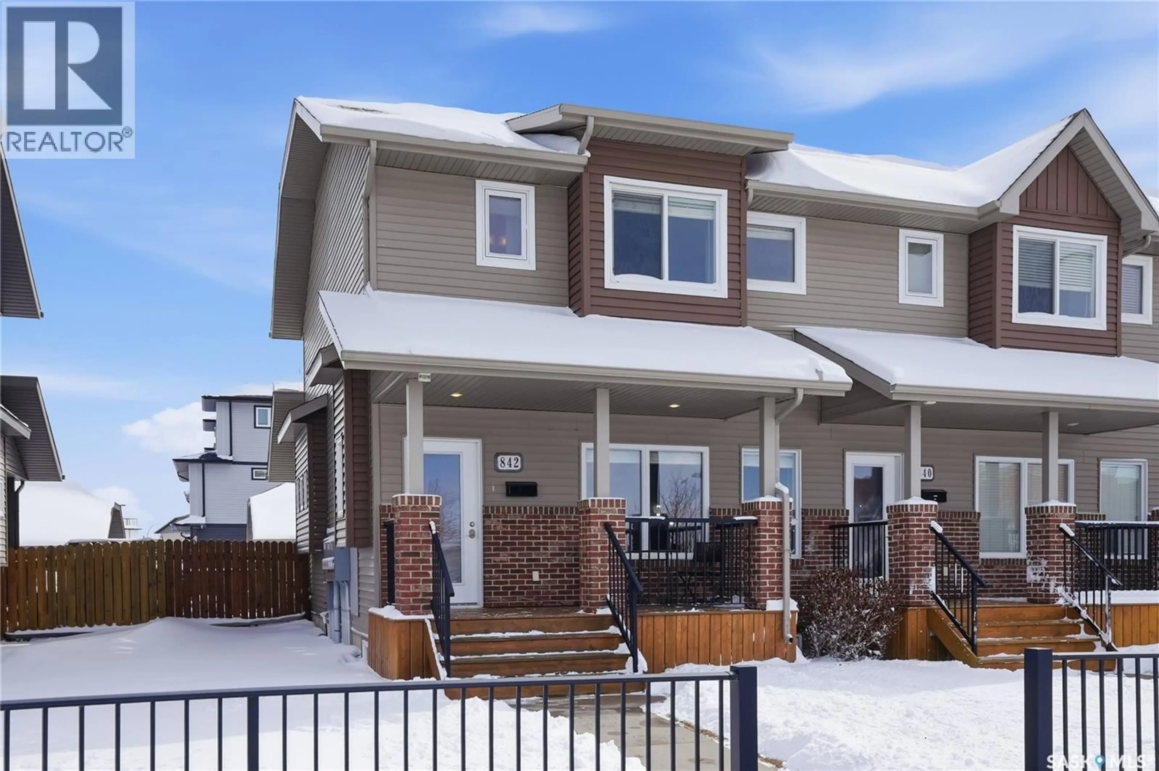 Home with vinyl exterior material, street for 842 STENSRUD ROAD, Saskatoon Saskatchewan S7W0M9