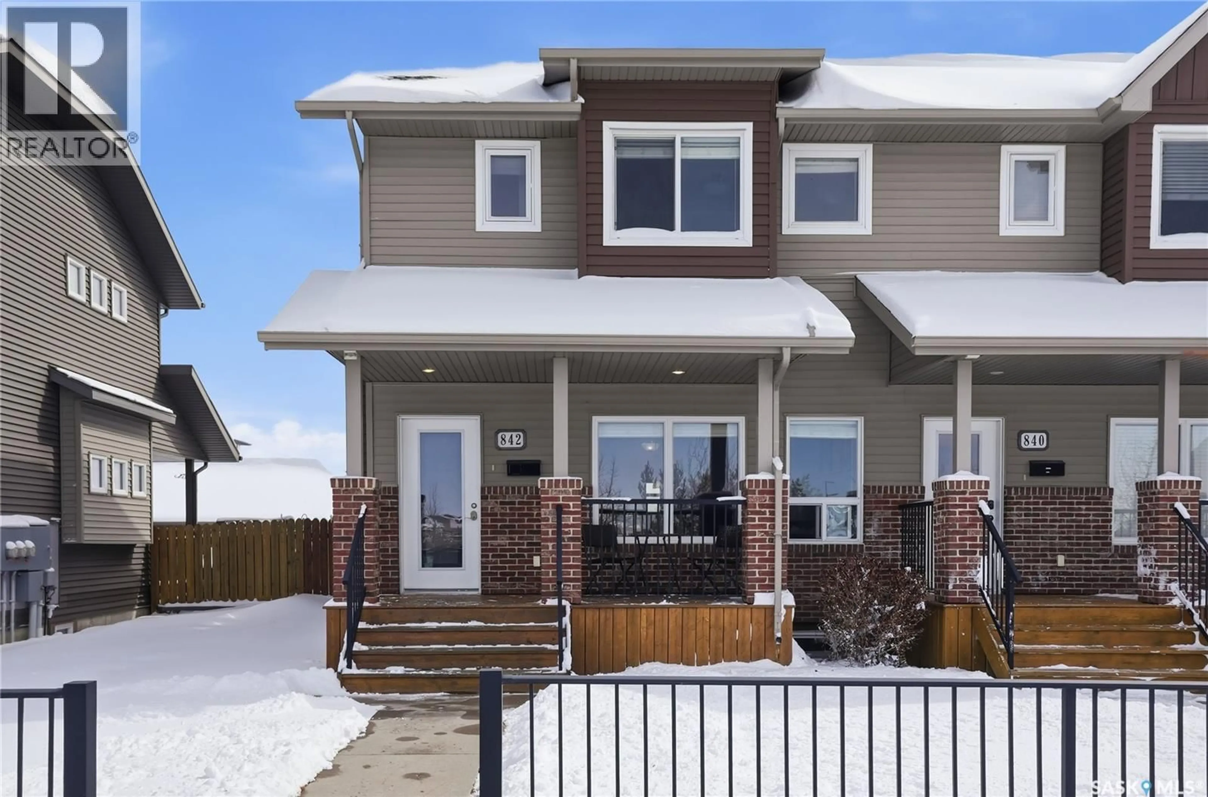 Home with vinyl exterior material, street for 842 STENSRUD ROAD, Saskatoon Saskatchewan S7W0M9