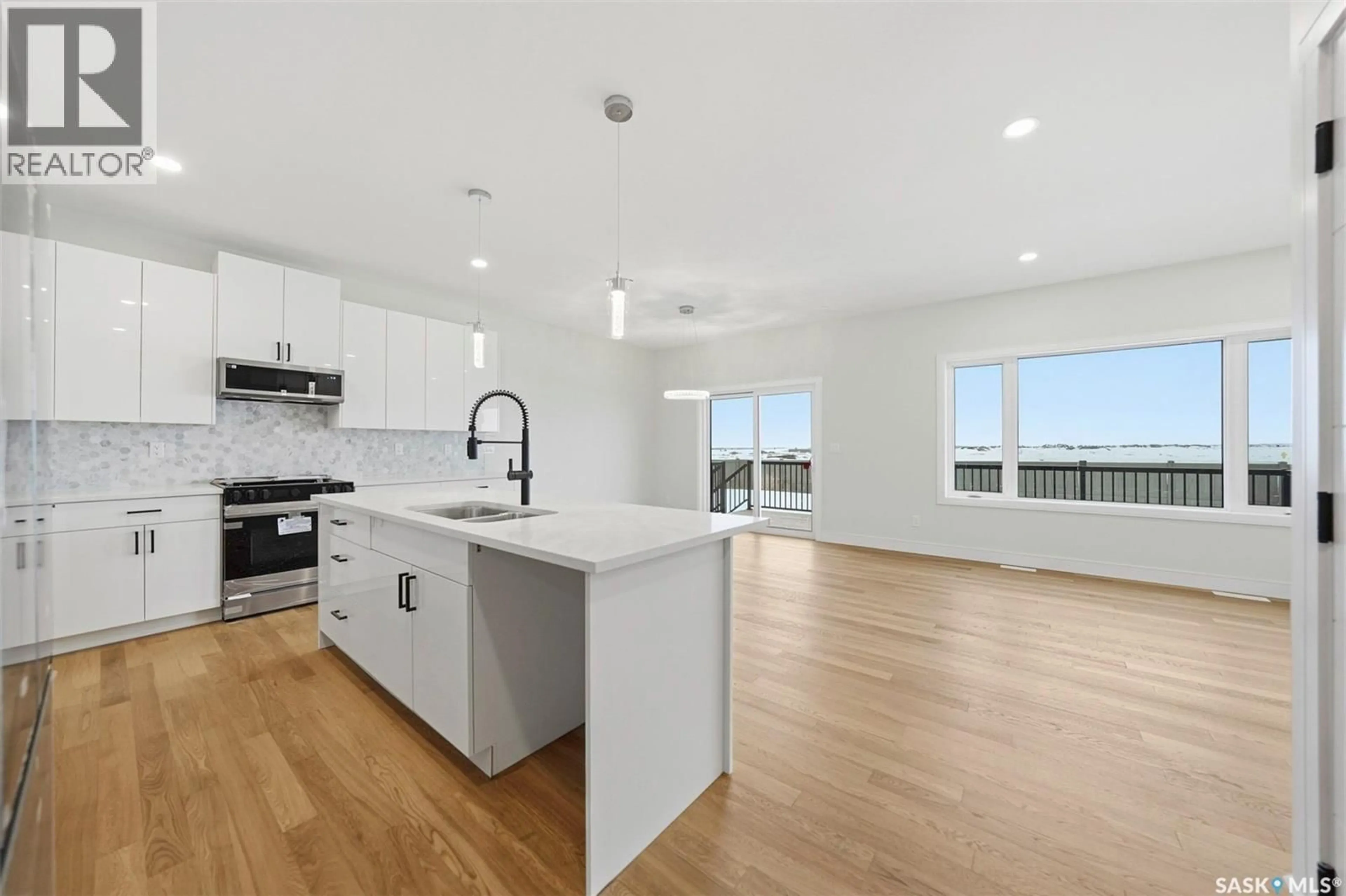 Open concept kitchen, unknown for 335 SHARMA CRESCENT, Saskatoon Saskatchewan S7W1J1