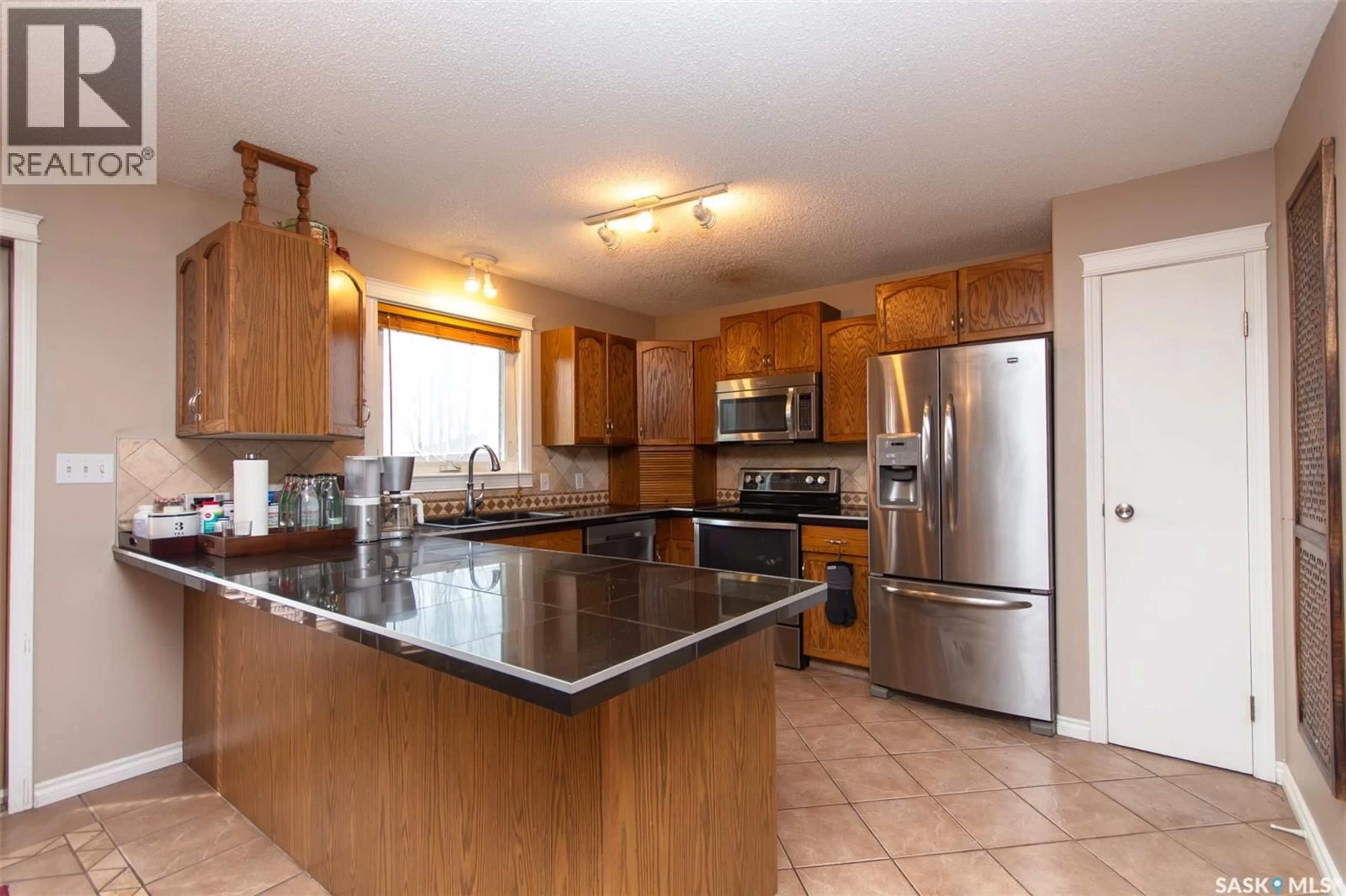 Open concept kitchen, unknown for 10314 BUNCE CRESCENT, North Battleford Saskatchewan S9A3Y4