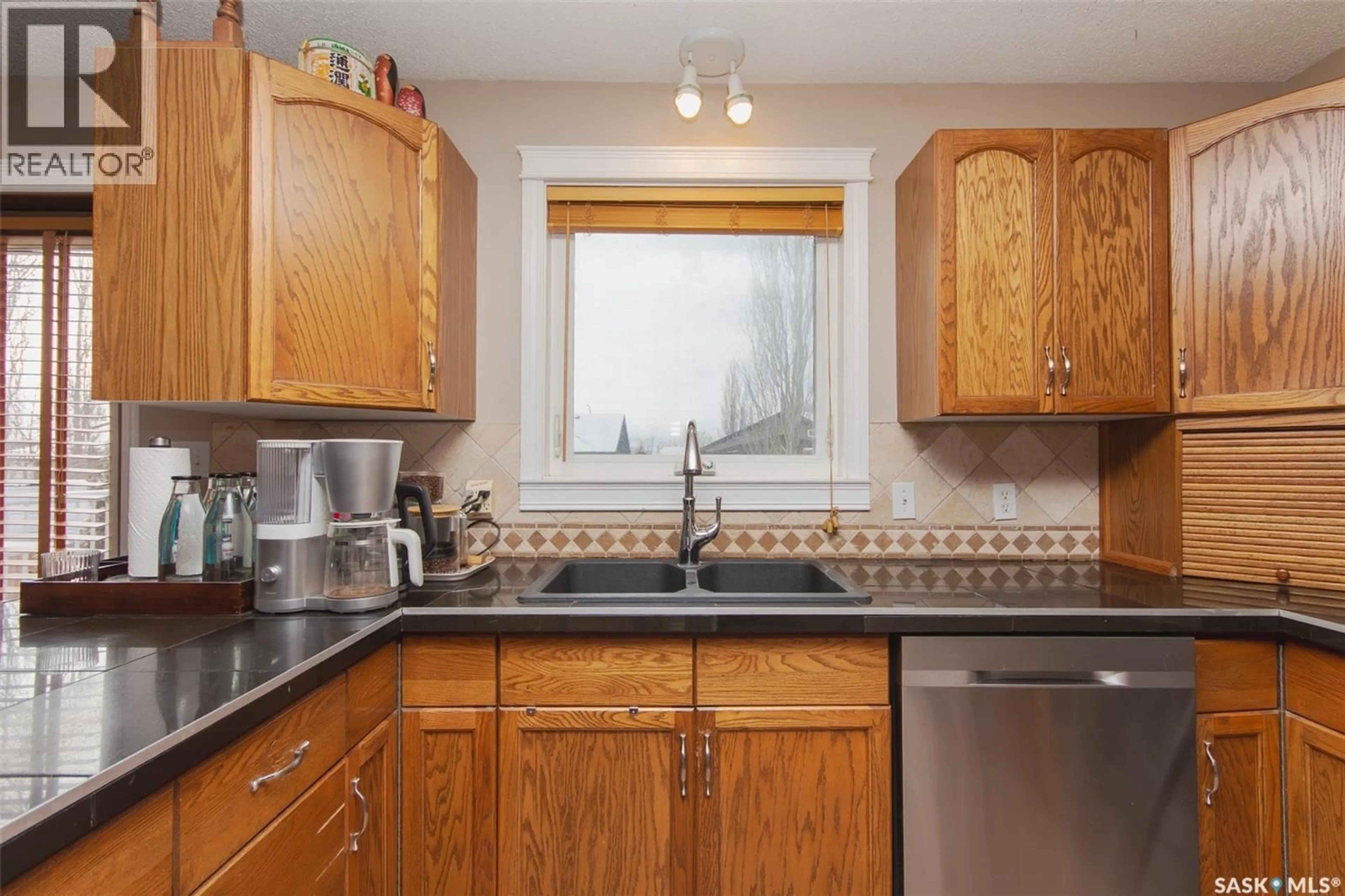 Standard kitchen, wood/laminate floor for 10314 BUNCE CRESCENT, North Battleford Saskatchewan S9A3Y4