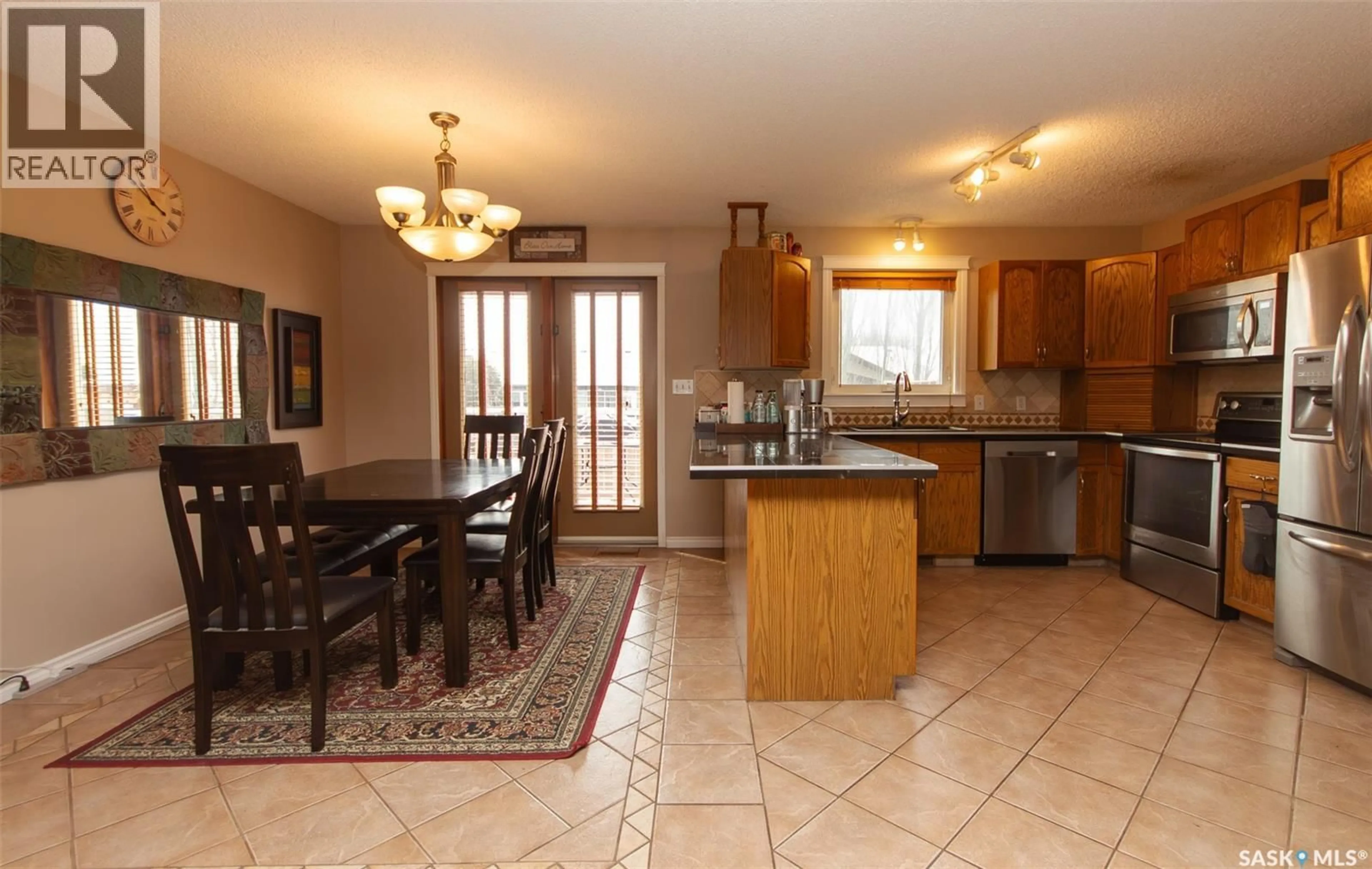Open concept kitchen, ceramic/tile floor for 10314 BUNCE CRESCENT, North Battleford Saskatchewan S9A3Y4