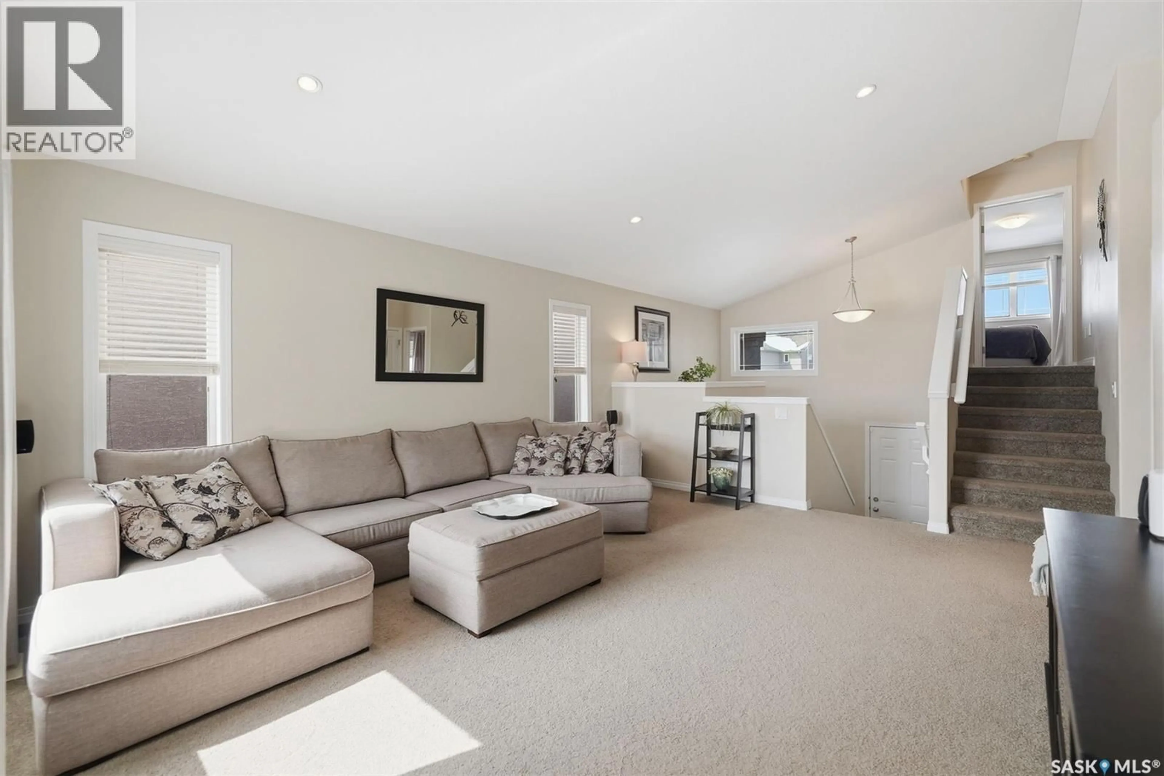 Living room with furniture, carpet floor for 1218 REMPEL CRESCENT, Saskatoon Saskatchewan S7T0M2