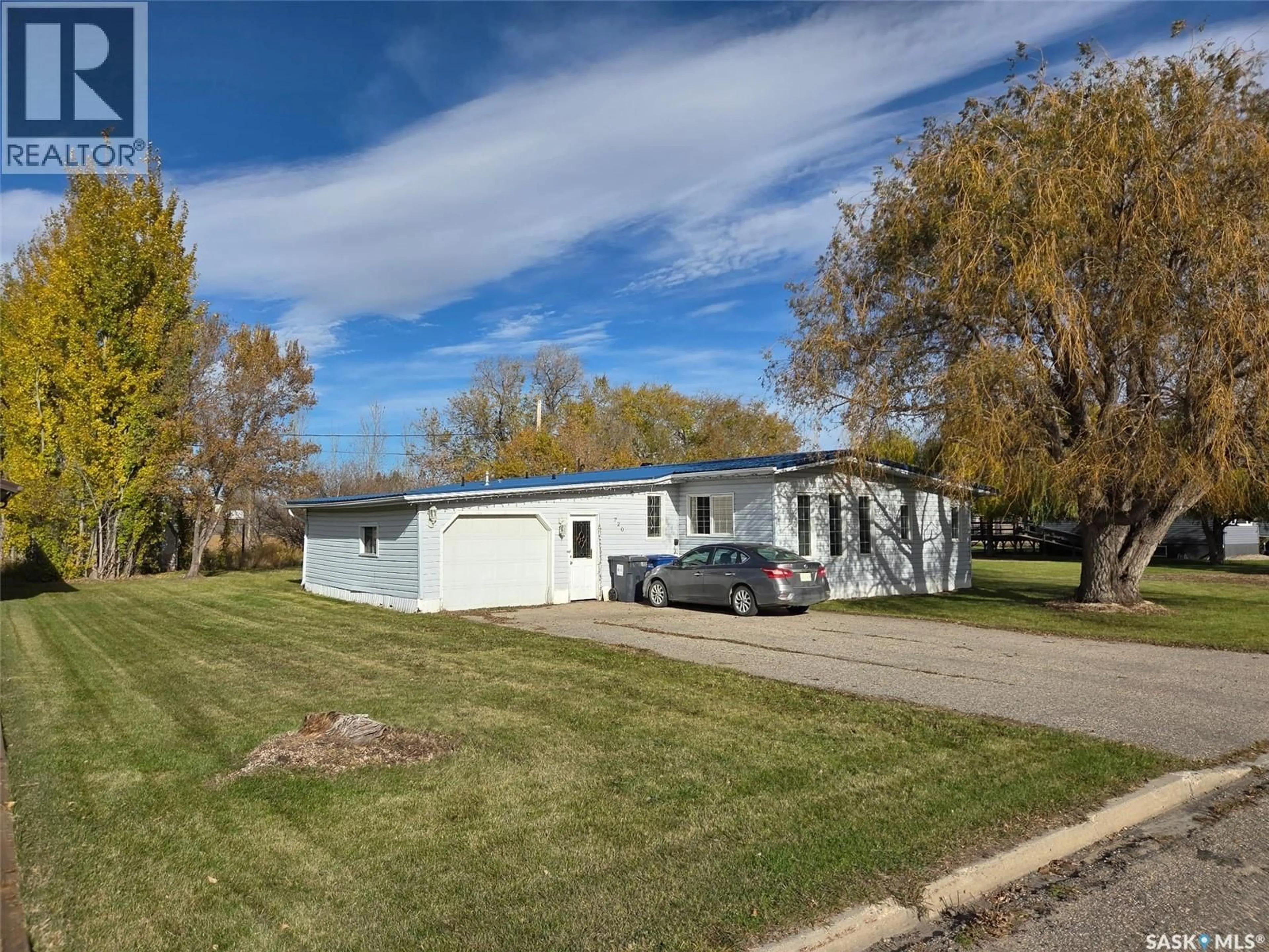 A pic from outside/outdoor area/front of a property/back of a property/a pic from drone, street for 720 MAPLE DRIVE, Esterhazy Saskatchewan S0A0X0