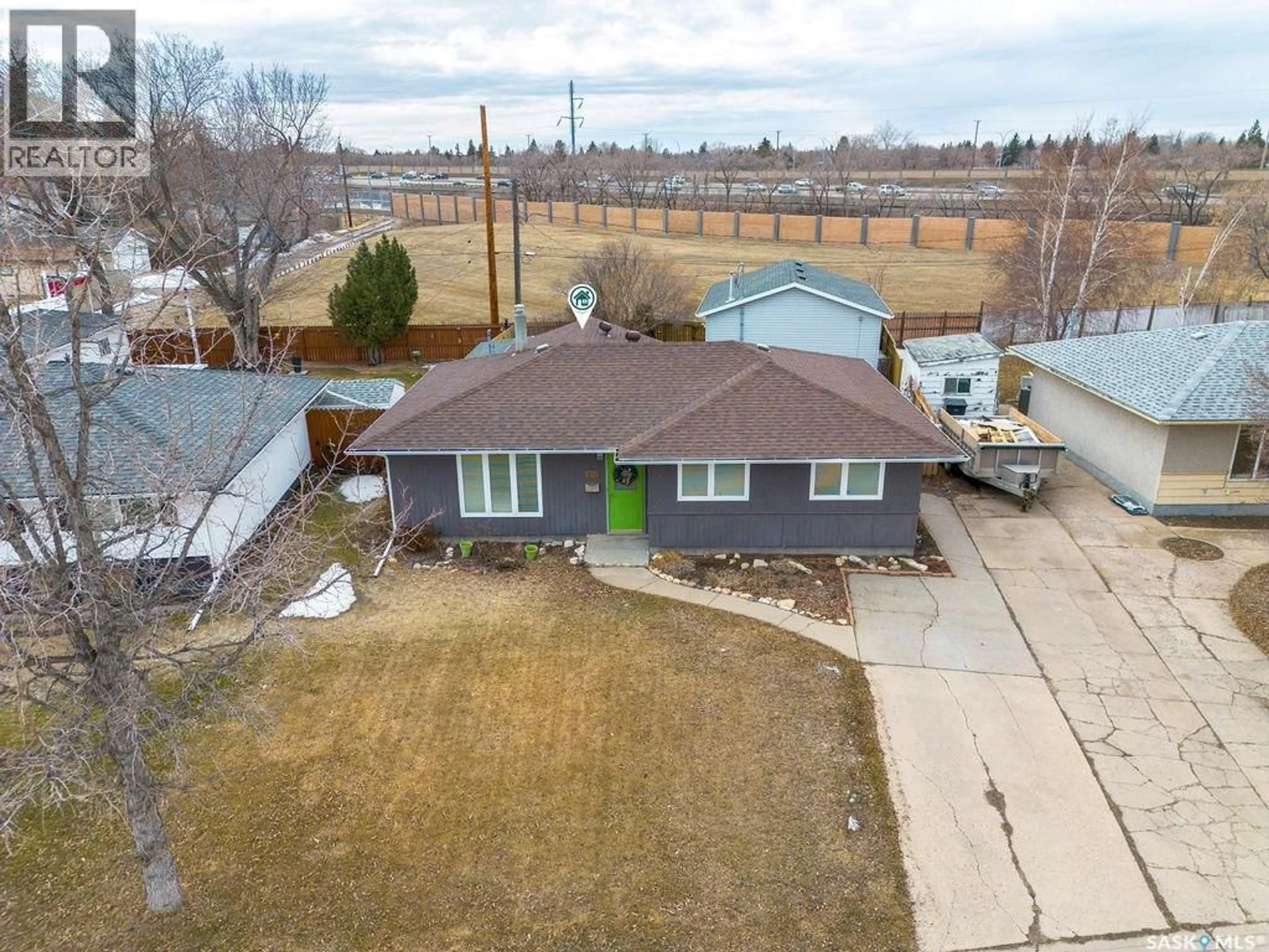 A pic from outside/outdoor area/front of a property/back of a property/a pic from drone, street for 2518 TOMLINSON CRESCENT, Saskatoon Saskatchewan S7L3N2