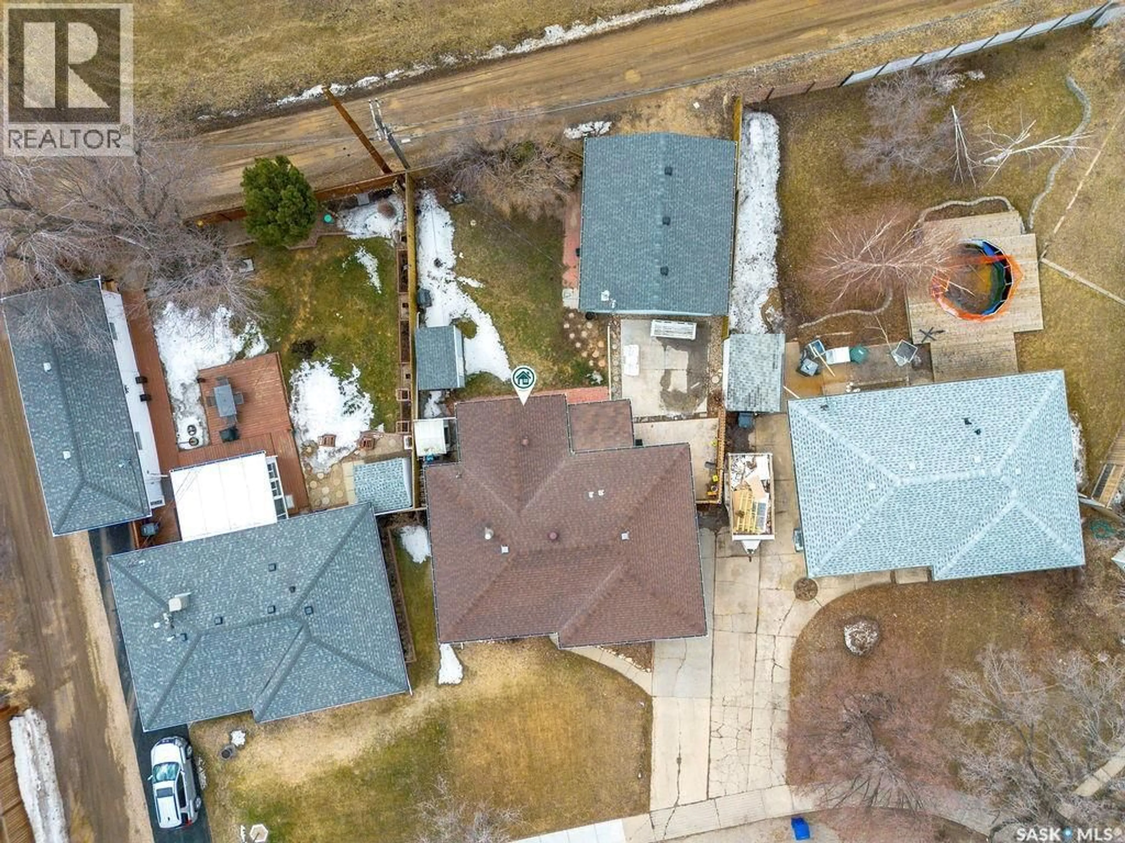 A pic from outside/outdoor area/front of a property/back of a property/a pic from drone, street for 2518 TOMLINSON CRESCENT, Saskatoon Saskatchewan S7L3N2