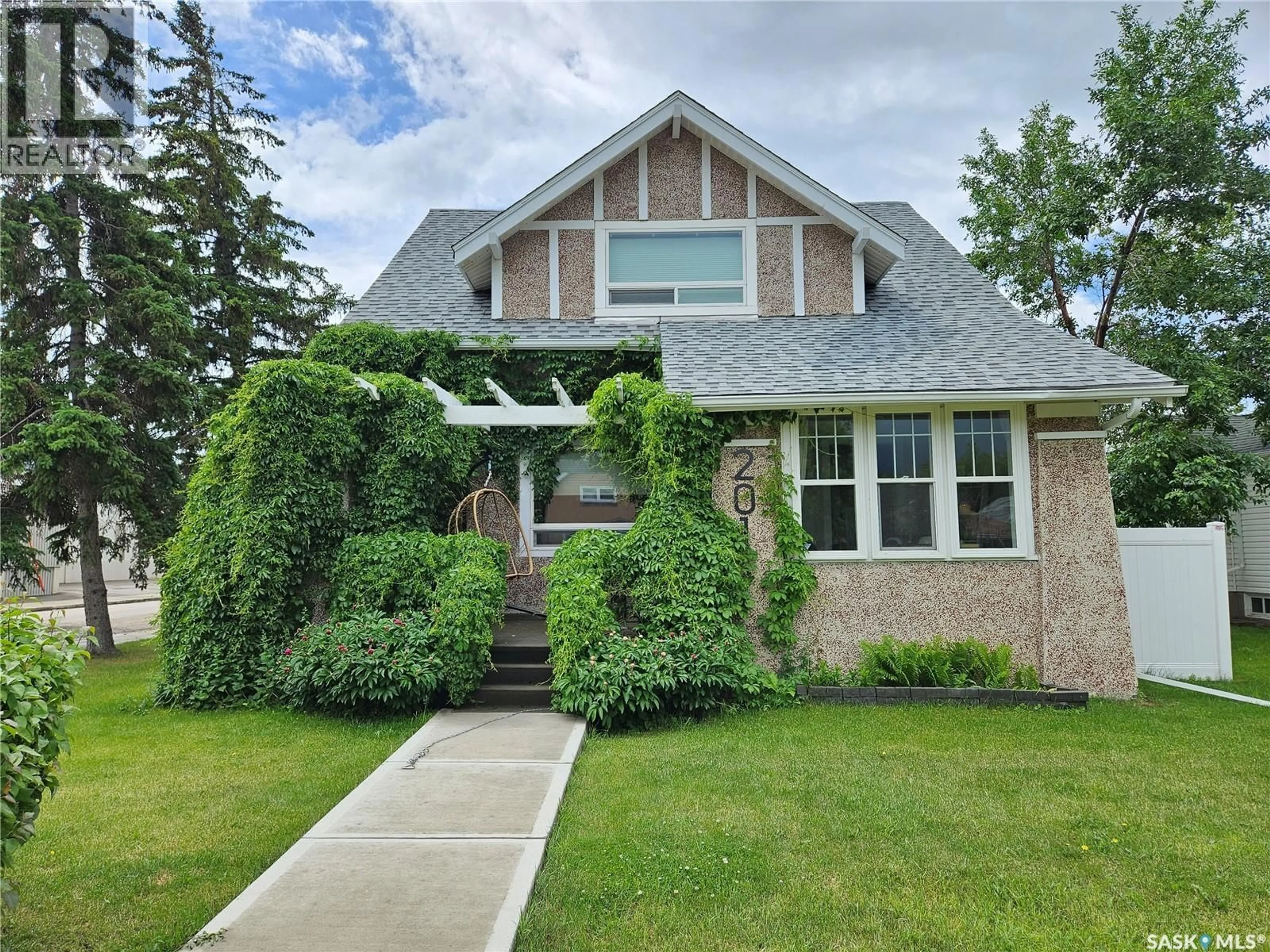 Home with brick exterior material, street for 201 ATHABASCA STREET, Moose Jaw Saskatchewan S6H2B8