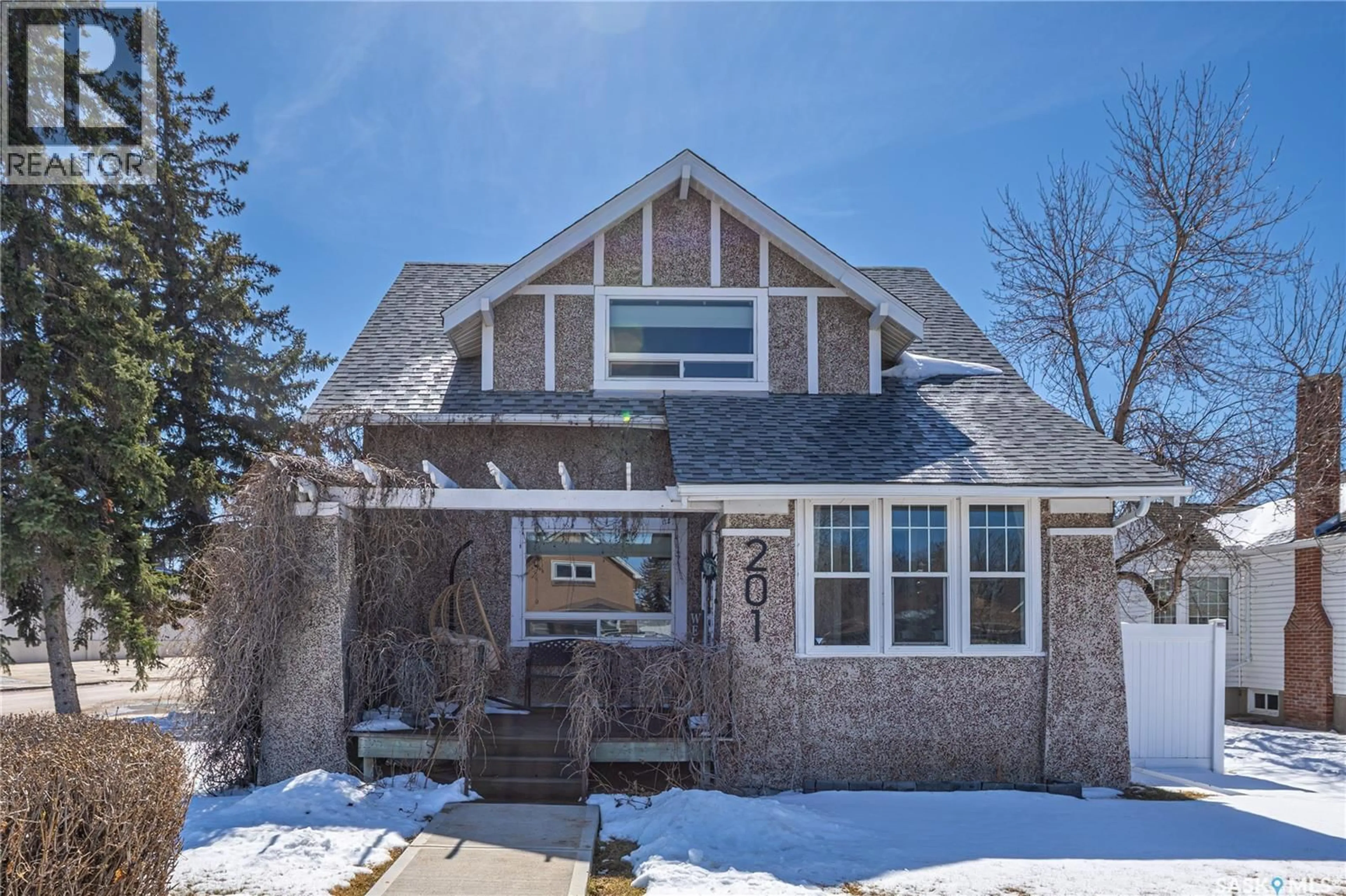 Home with brick exterior material, street for 201 ATHABASCA STREET, Moose Jaw Saskatchewan S6H2B8