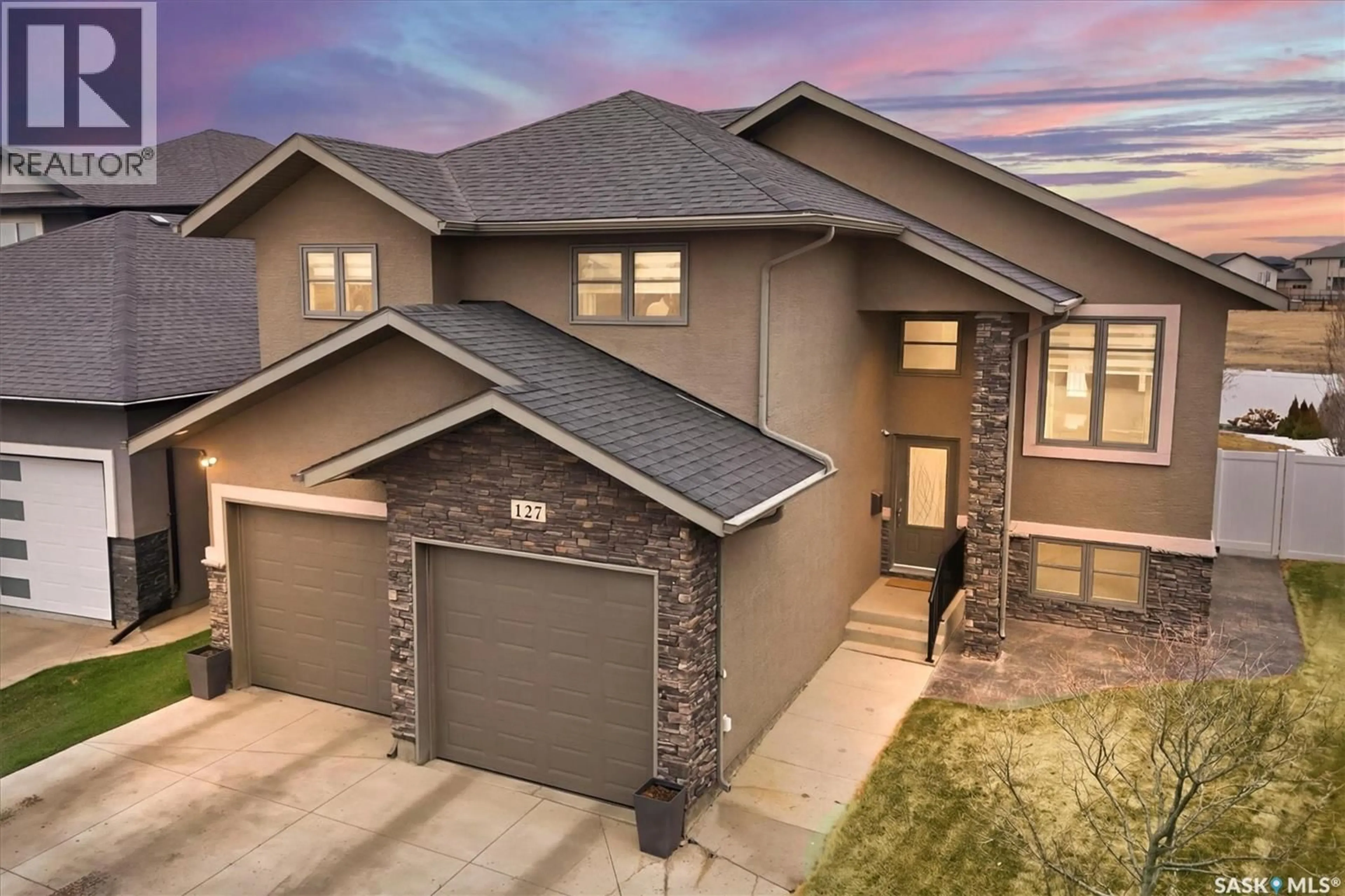 Home with brick exterior material, street for 127 SCHUMACHER BAY, Saskatoon Saskatchewan S7V0H7
