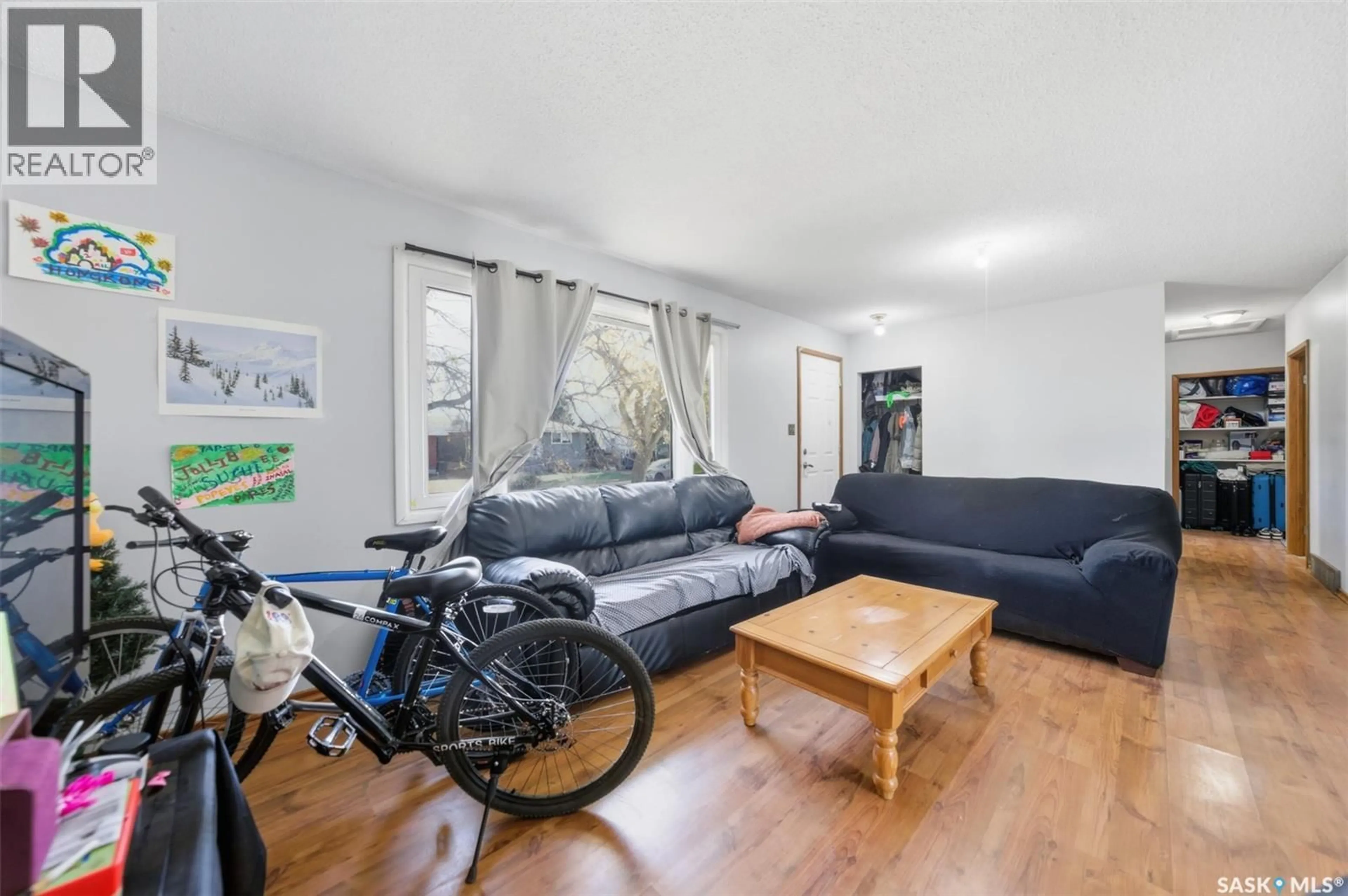 Living room with furniture, unknown for 1051 109TH STREET, North Battleford Saskatchewan S9A2E3